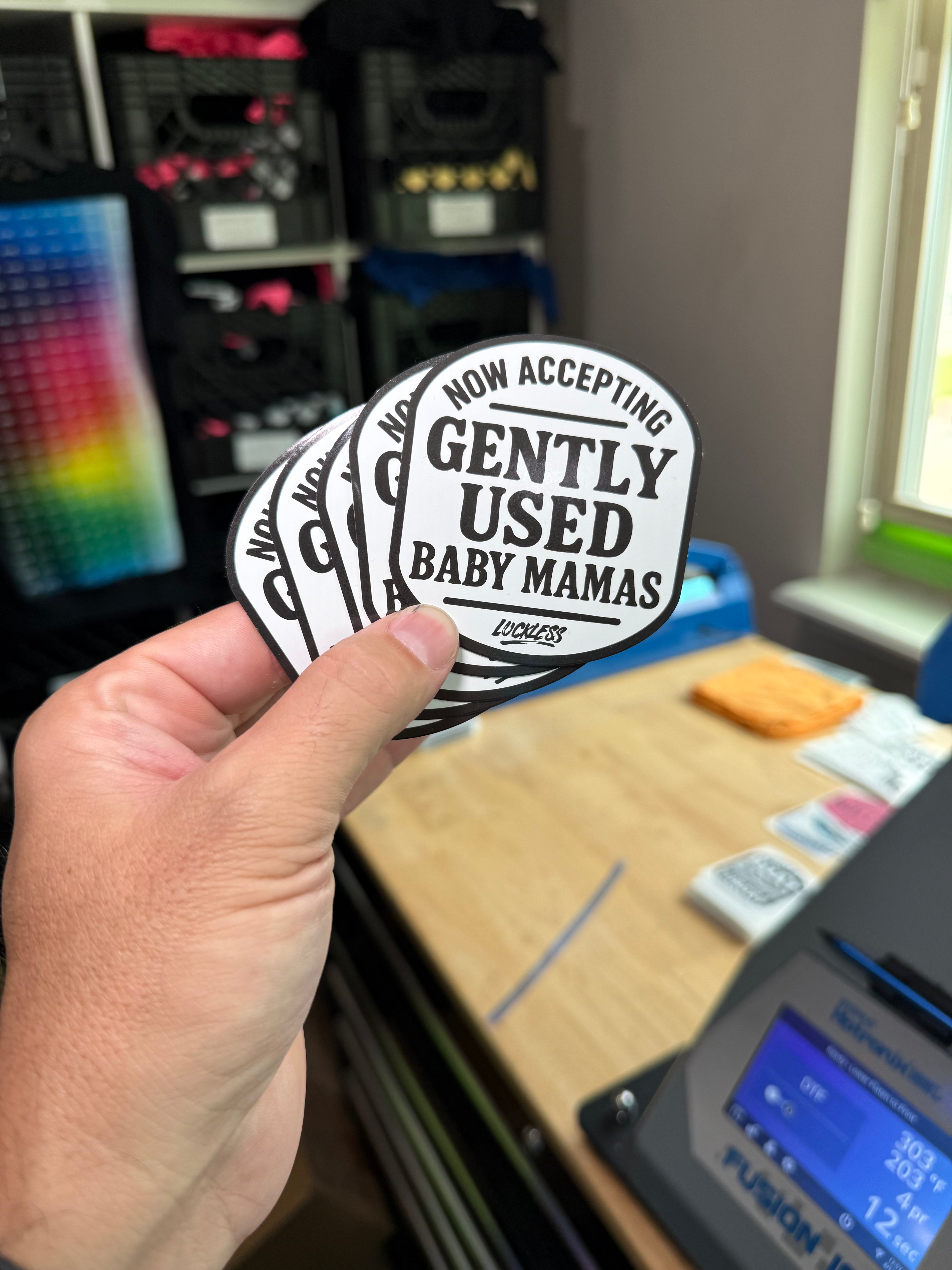 Luckless Outfitters Now Accepting Gently Used Baby Mamas Sticker — lifestyle context