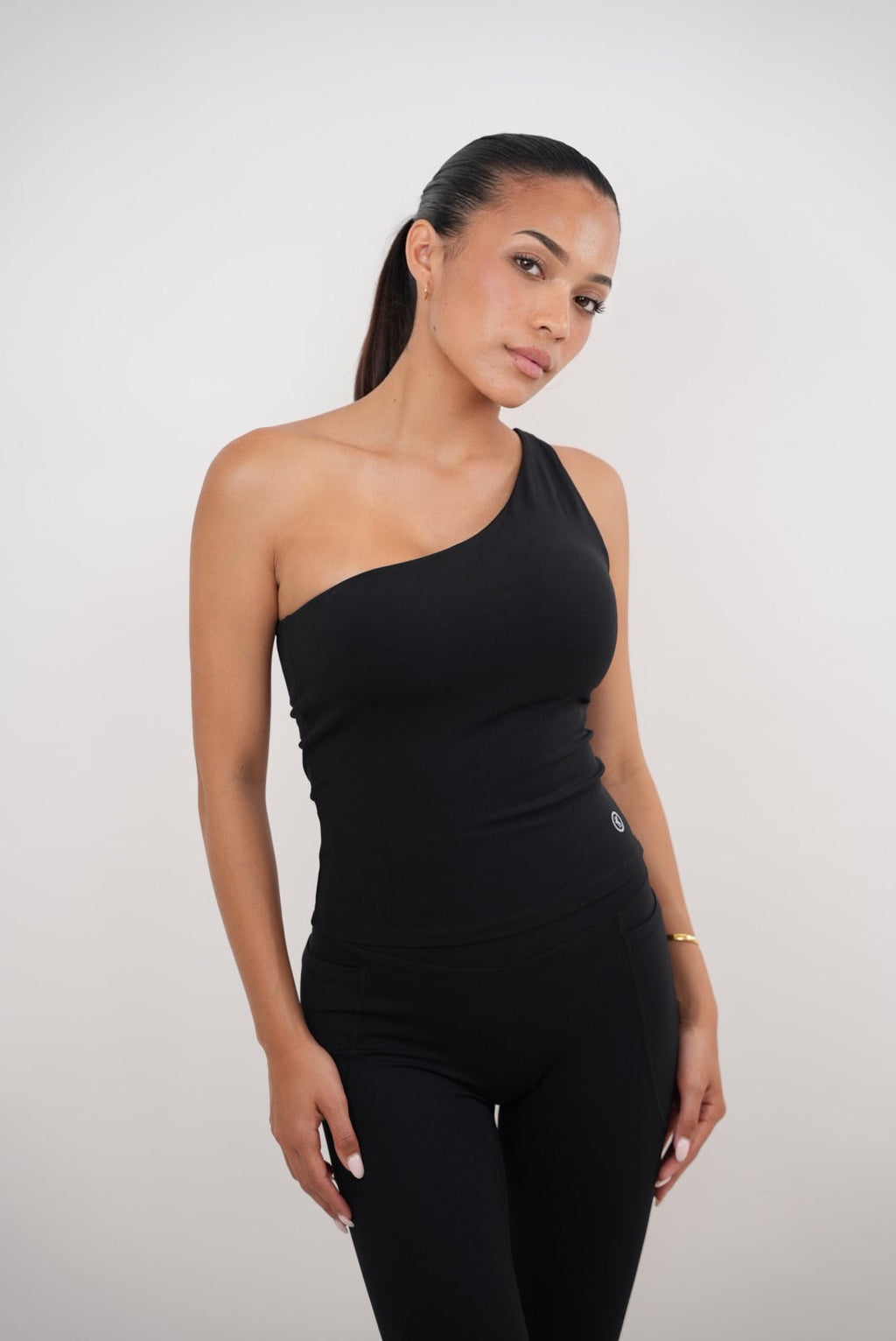 KIMITH BRAND I Am Wealthy Black One Shoulder Top — back view