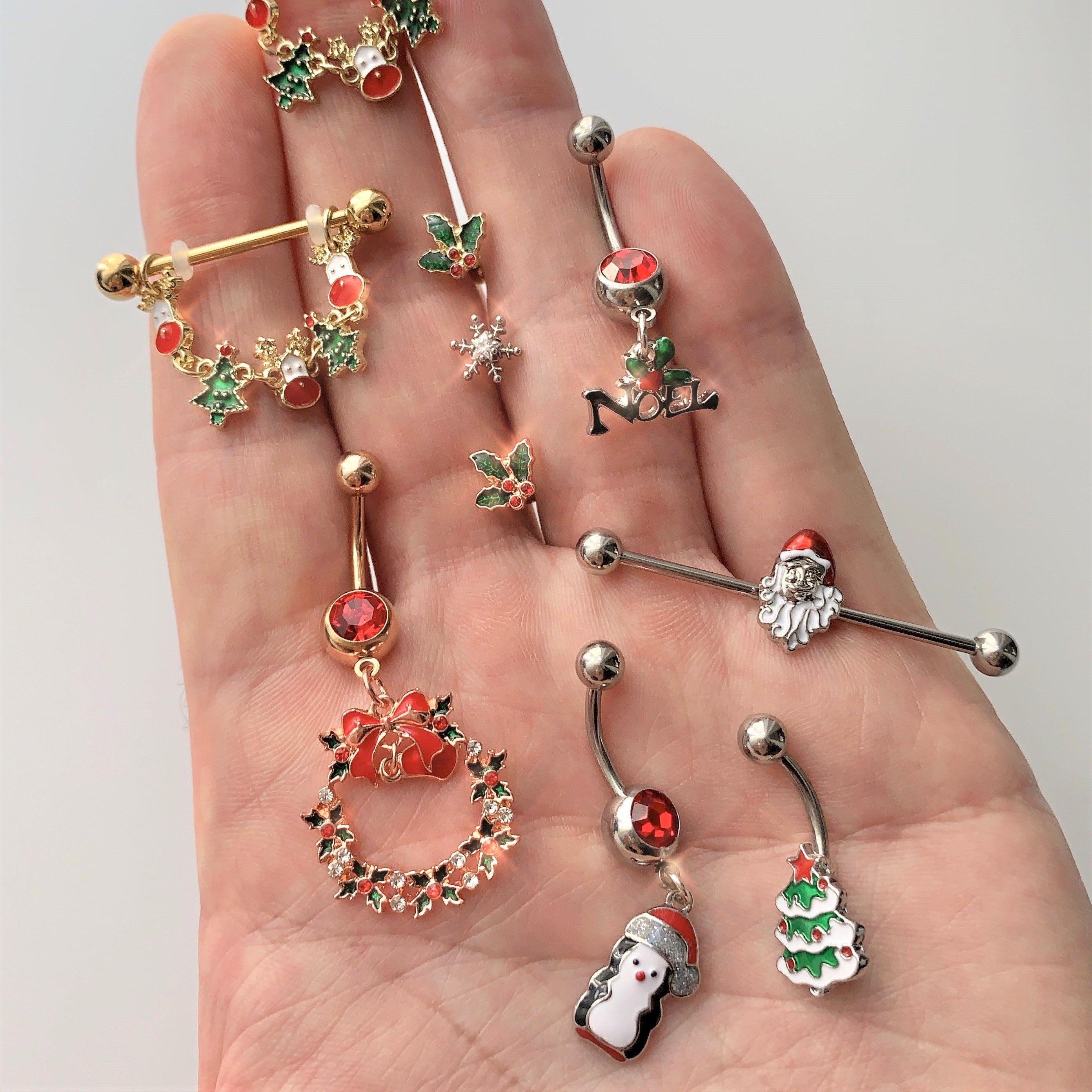 BodyCandy Red Gem Holiday Penguin Christmas Dangle Belly Ring — detail close-up