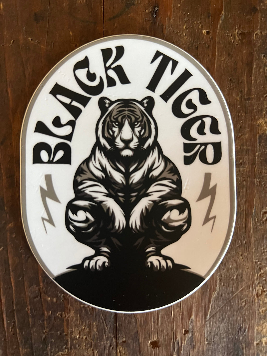 Black Tiger International Black Tiger Oval White Sticker — detail and construction
