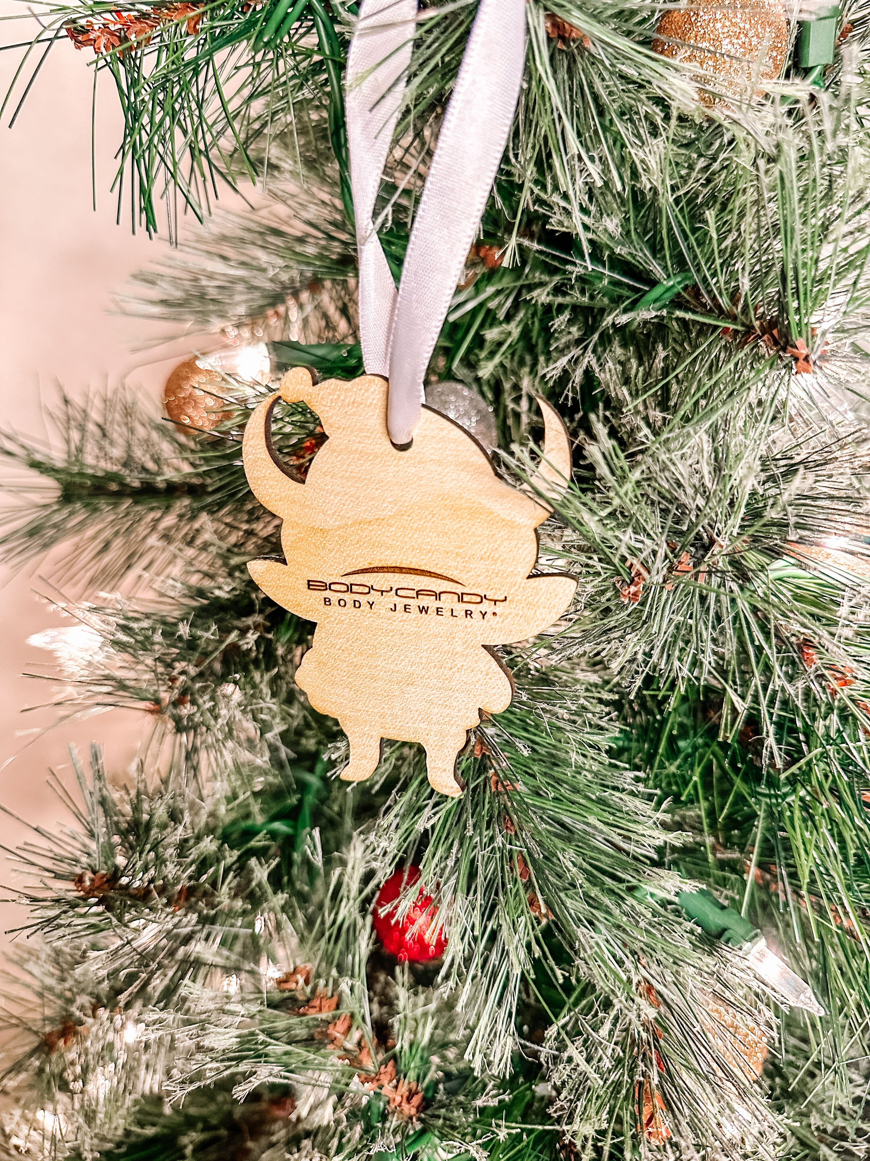 BodyCandy Wood Holiday Krampus Cutie Christmas Ornament — lifestyle context