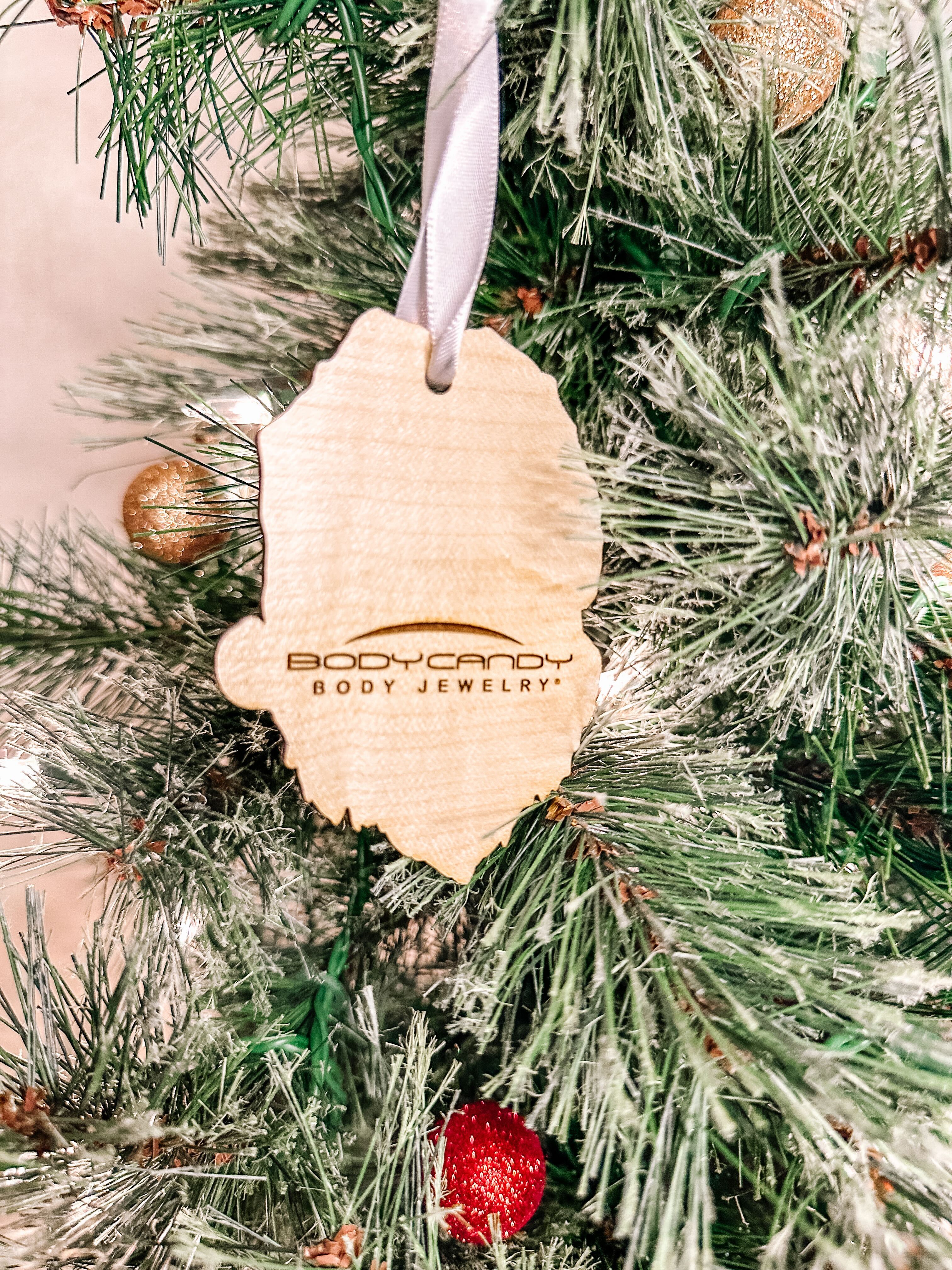 BodyCandy Wood Holiday Skeleton Claus Christmas Ornament — lifestyle context