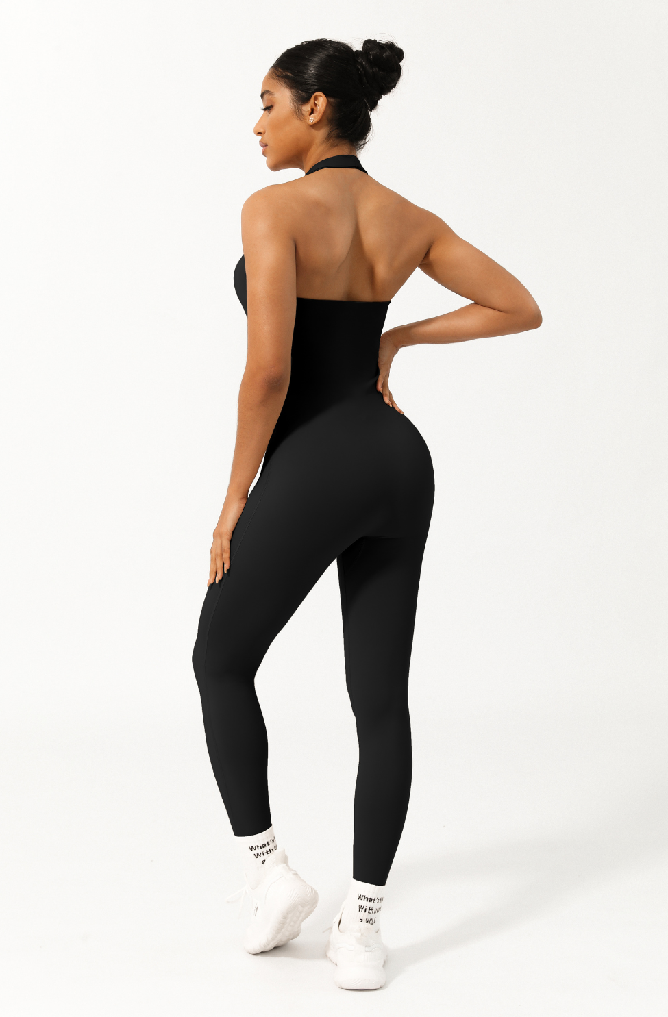 KIMITH BRAND I Am Powerful Bodysuit in Black — lifestyle worn / used context