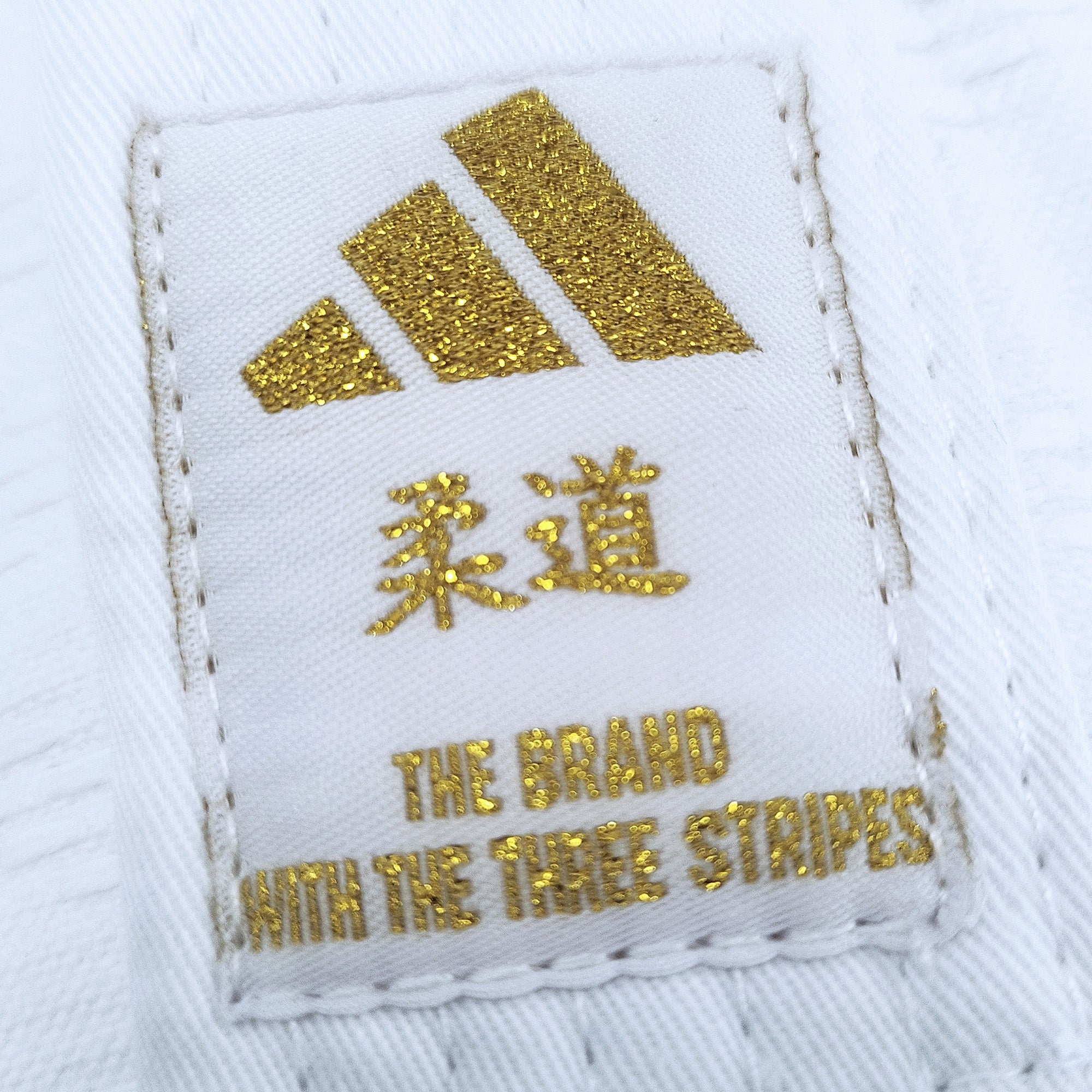 Judo Gear USA J690 Quest Gold Stripes — side view