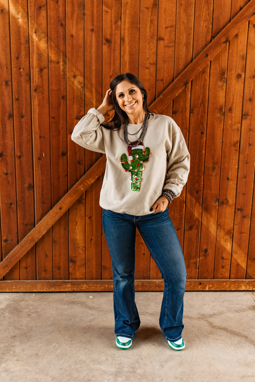 Wild Junkie Christmas Cactus Sequins Patch Sweatshirt — Wild Junkie branding close-up