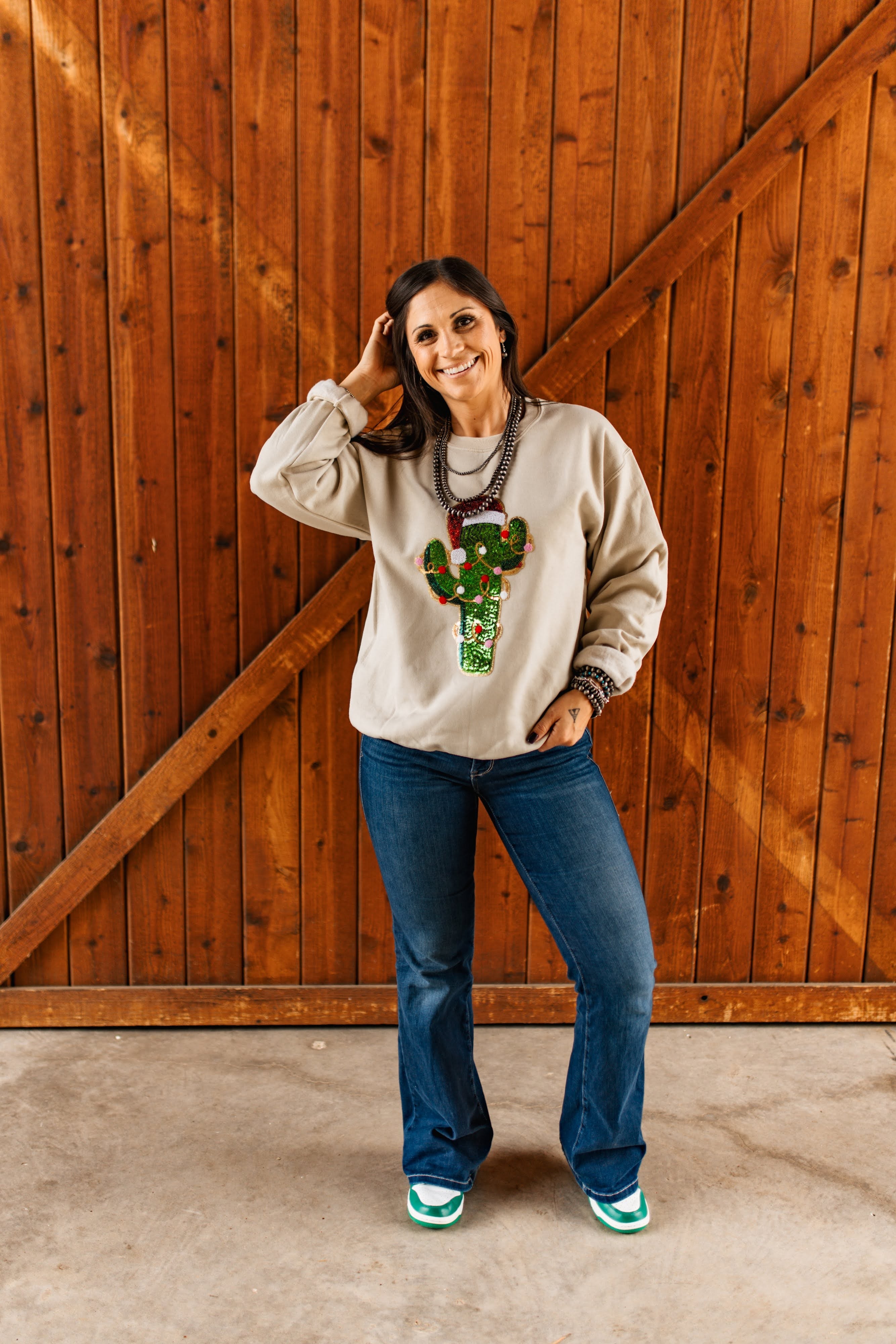 Wild Junkie Christmas Cactus Sequins Patch Sweatshirt — Wild Junkie branding close-up