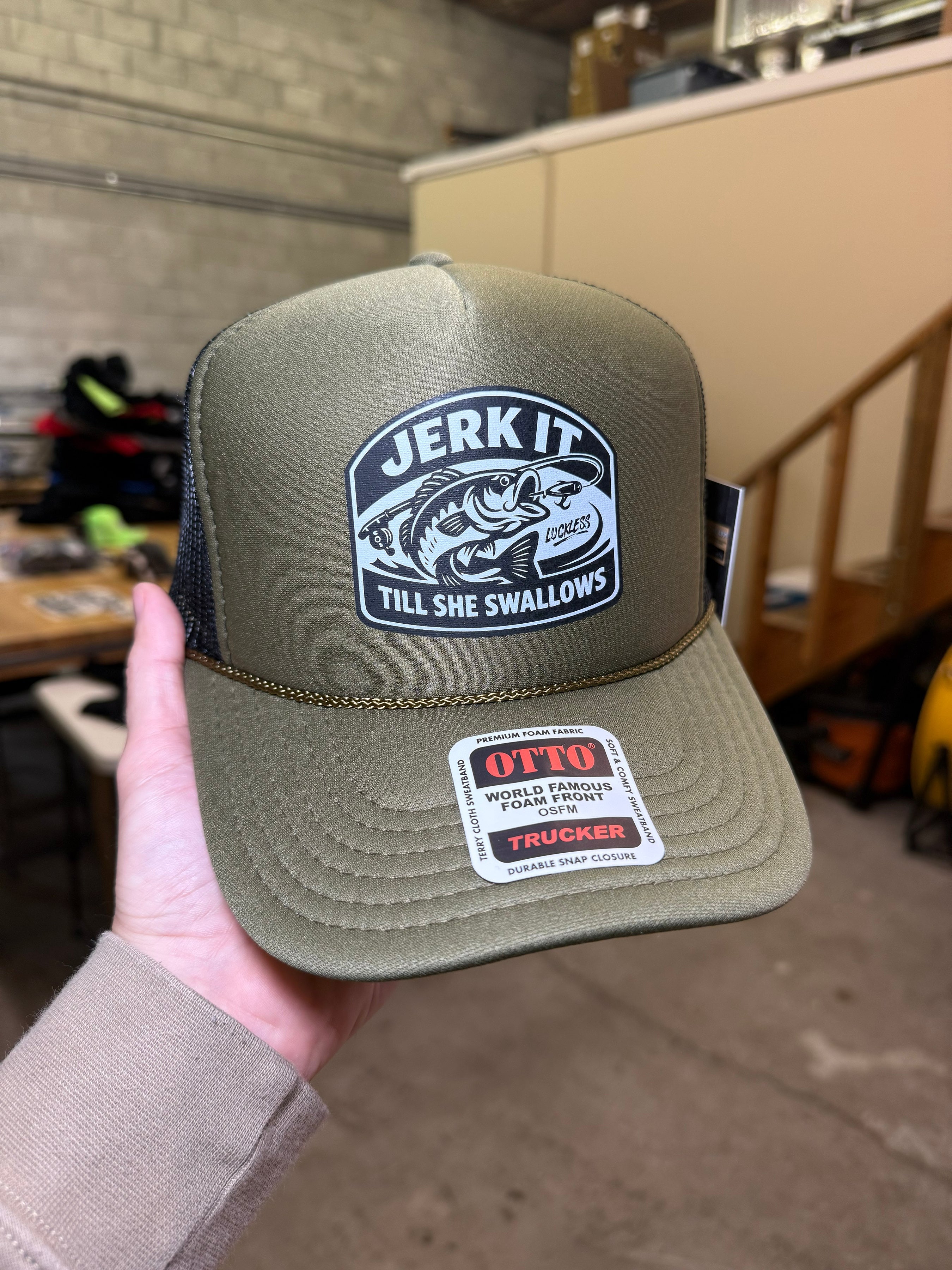 Luckless Outfitters Jerk It Till She Swallows | Funny Trucker Hat — detail close-up