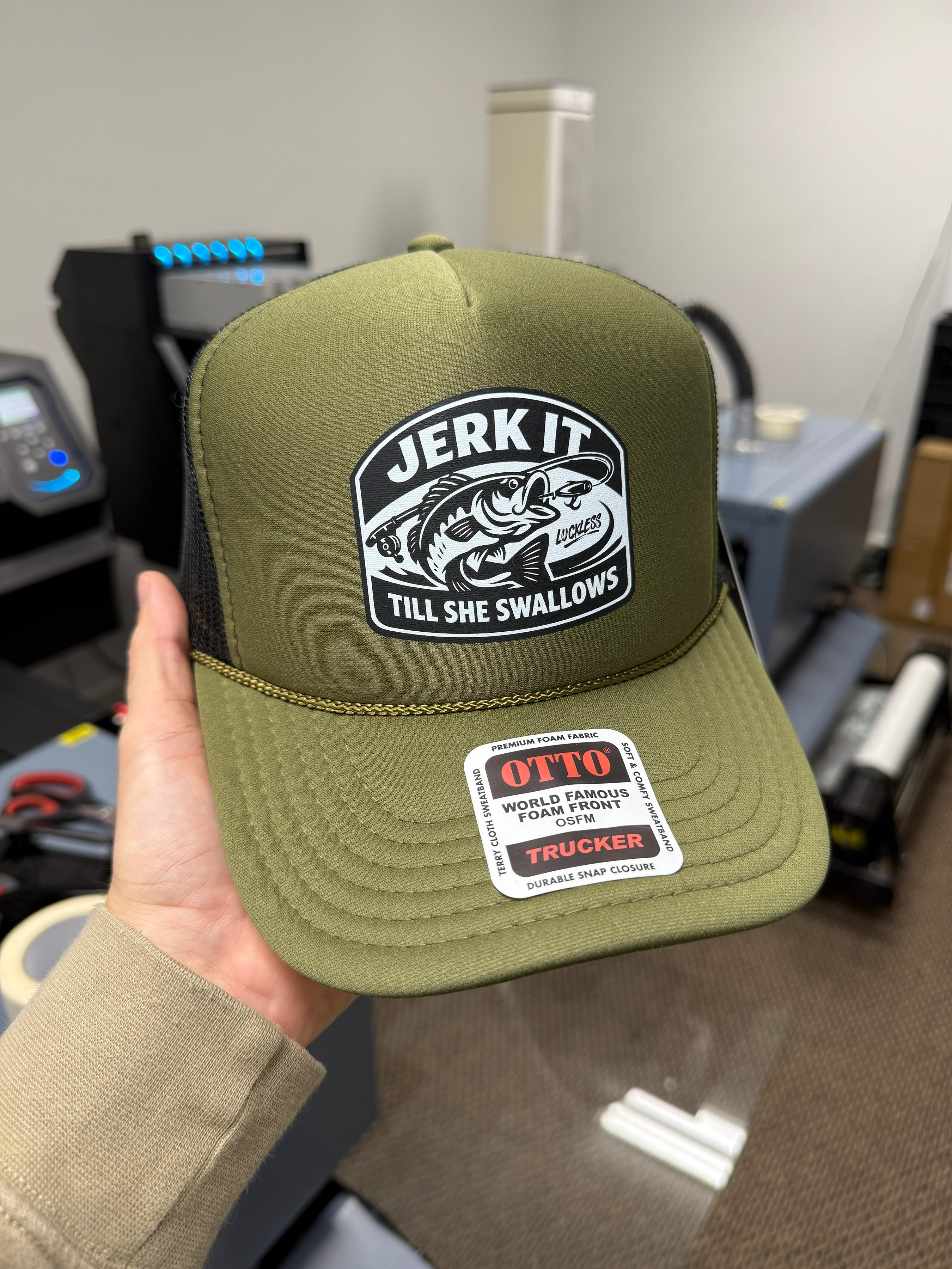 Luckless Outfitters Jerk It Till She Swallows | Funny Trucker Hat — back view