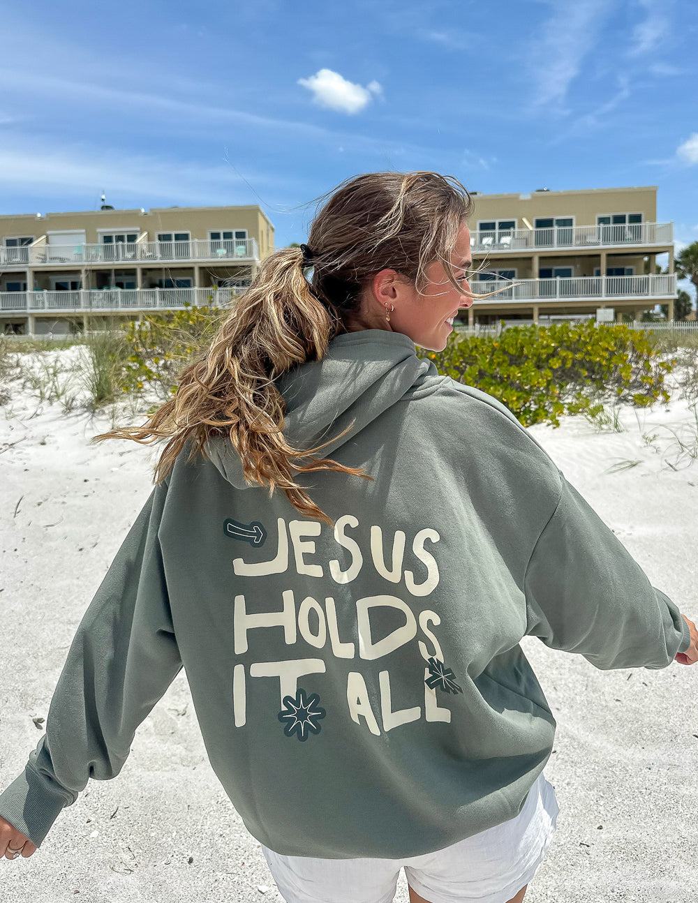 Elevated Faith Jesus Holds It All Unisex Hoodie — main product shot