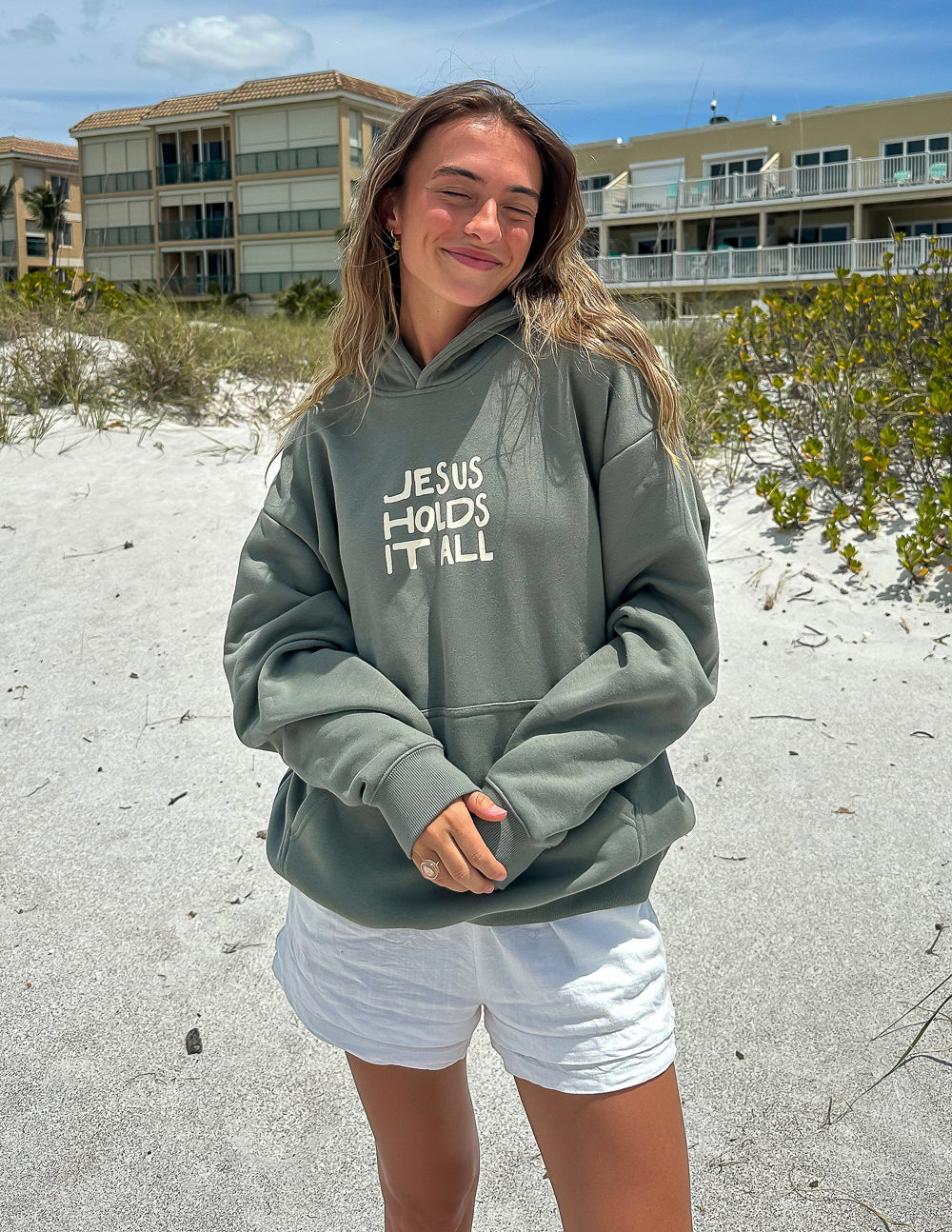 Elevated Faith Jesus Holds It All Unisex Hoodie — construction detail