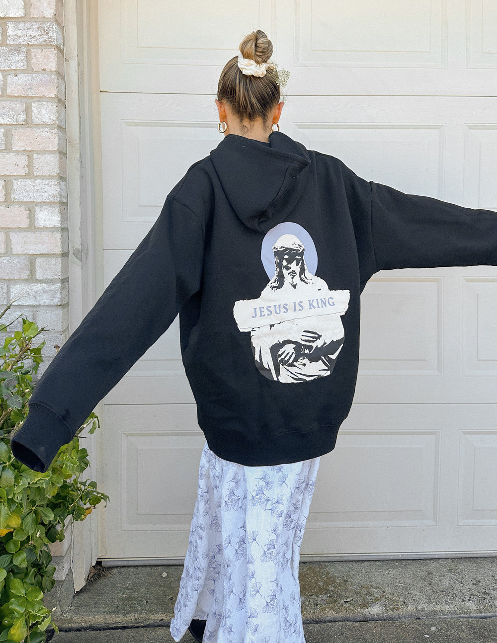 Elevated Faith Jesus Is King Black Unisex Hoodie — main product shot