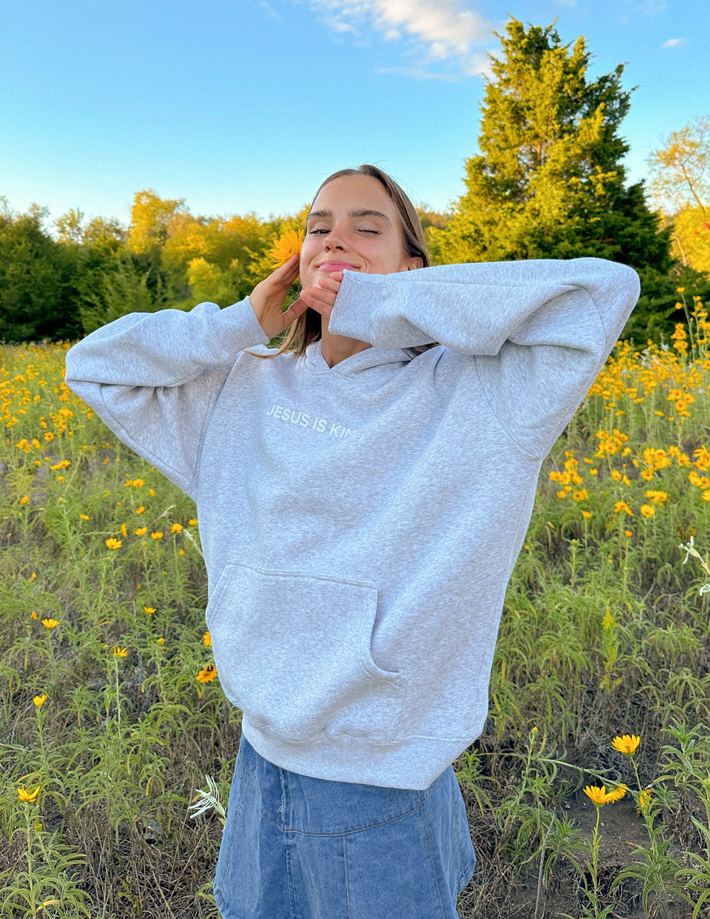 Elevated Faith Jesus Is King Heather Grey Unisex Hoodie — lifestyle context