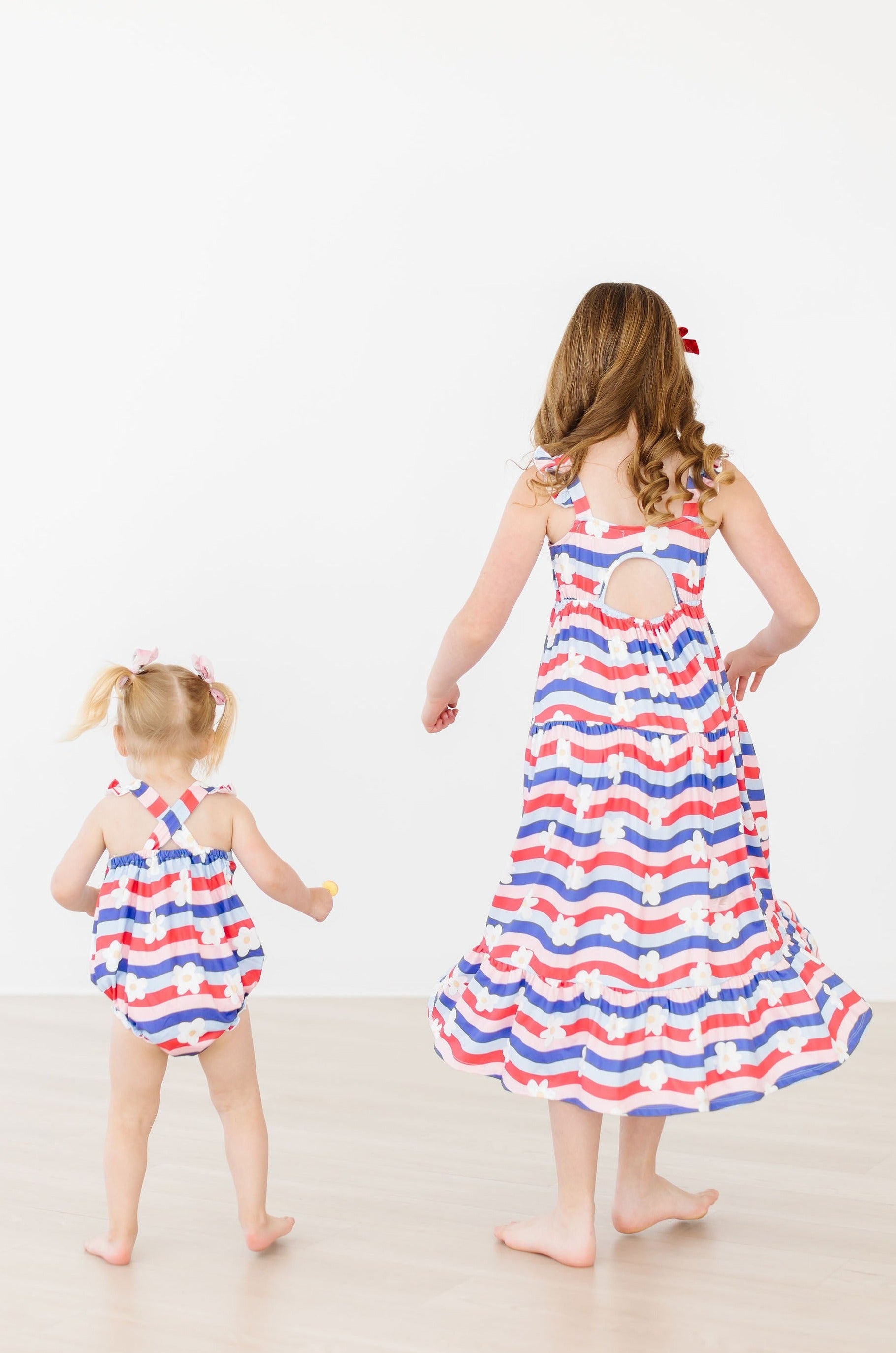 Mila & Rose ® July Vibes Ruffle Cross Back Romper — lifestyle context