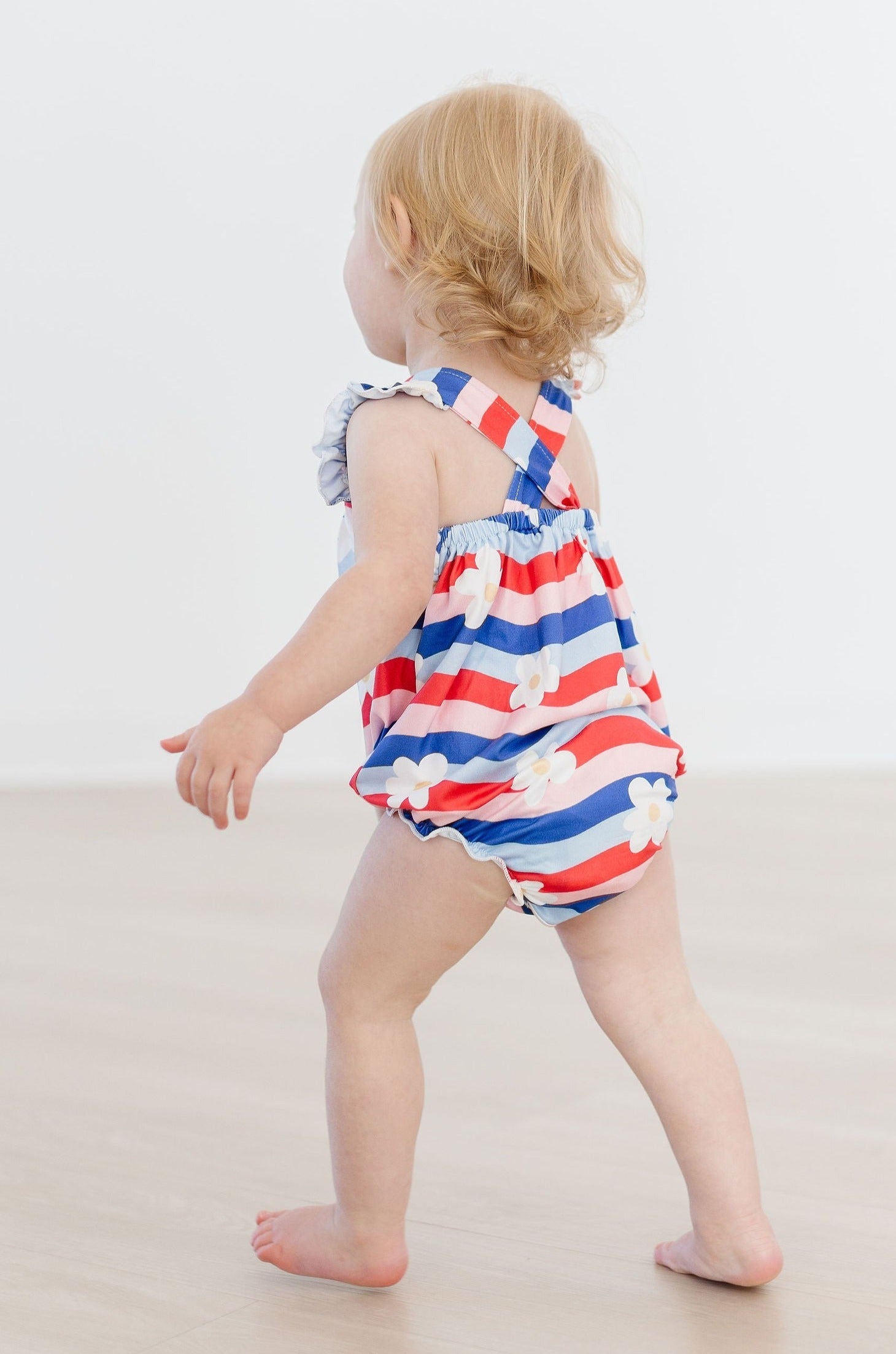 Mila & Rose ® July Vibes Ruffle Cross Back Romper — side view