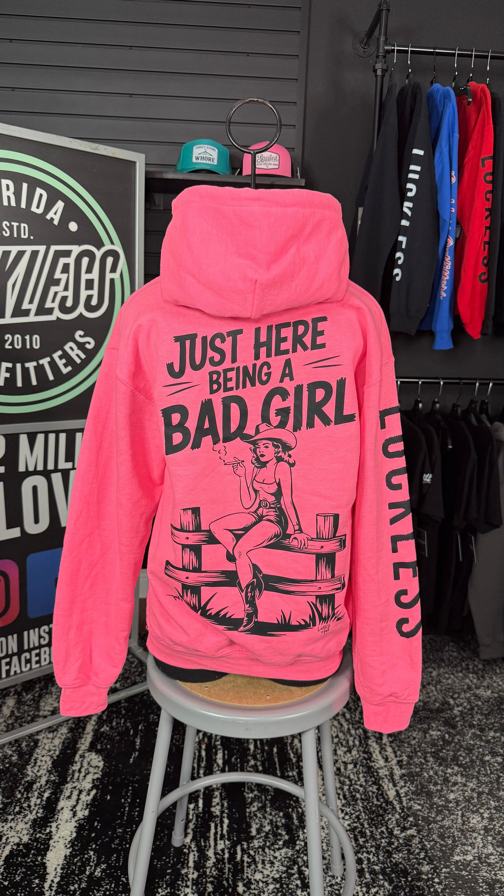 Luckless Outfitters Bad Girl Neon Pink Hoodie — lifestyle context