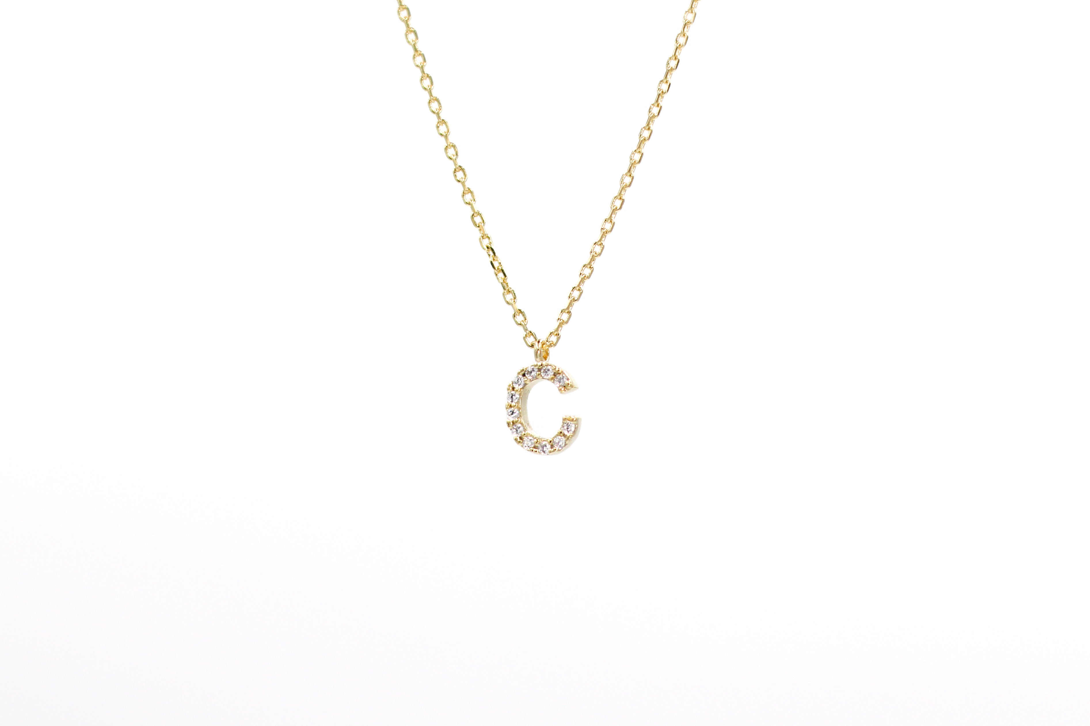 KADOU BOUTIQUE Cubic Zirconia Letter Necklace — lifestyle context