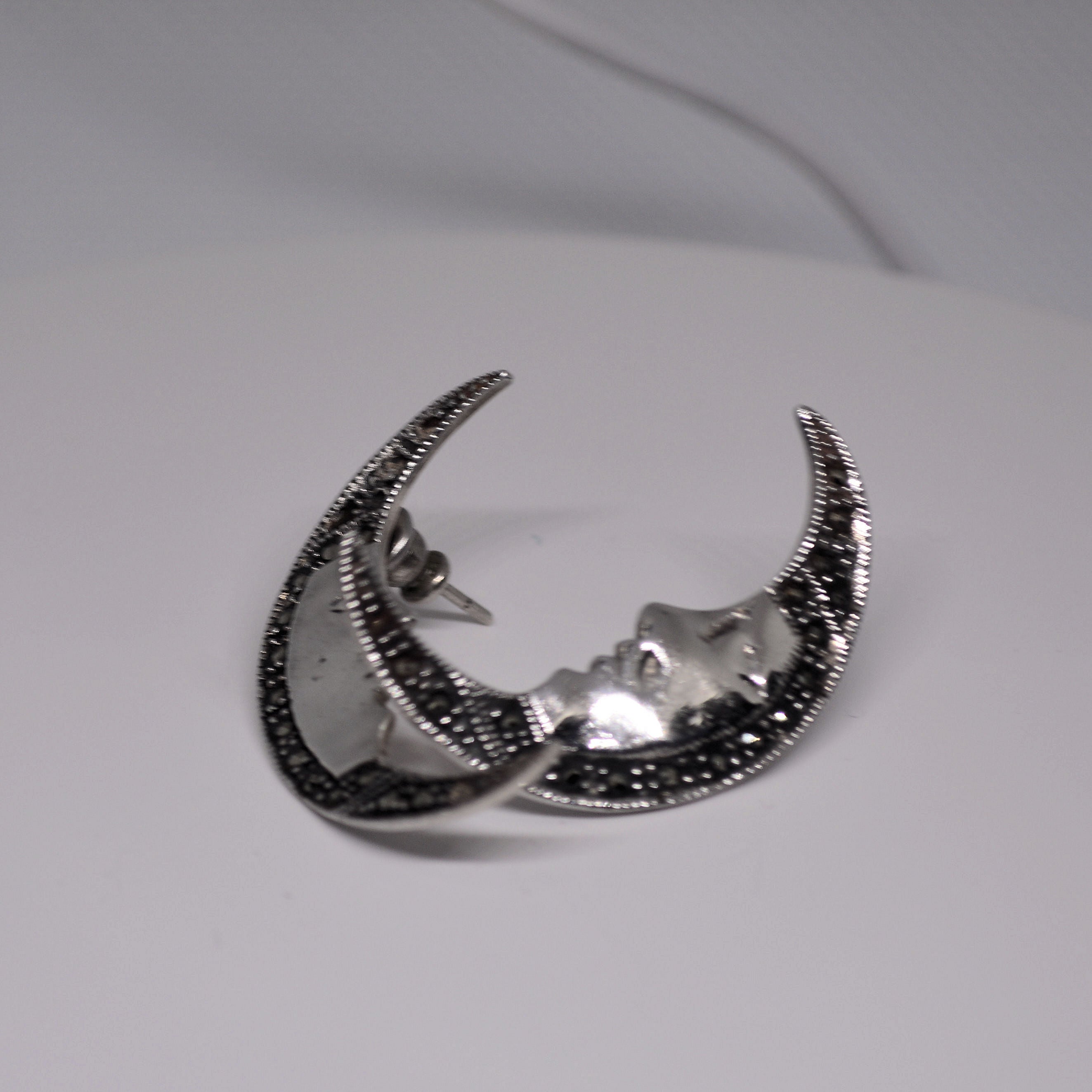 Just Neat Stuff Moon Earrings — detail close-up