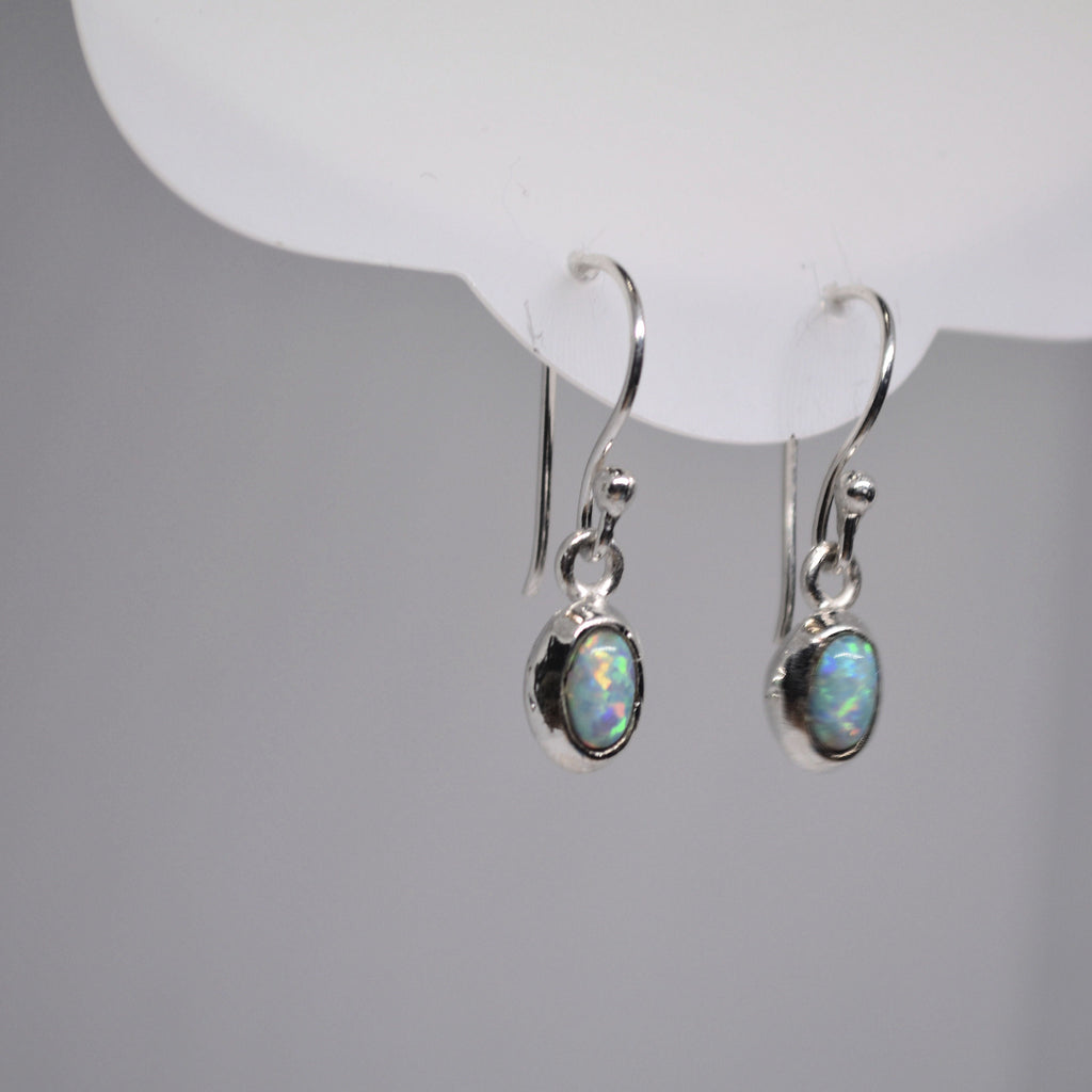 Just Neat Stuff White Opal Earrings — main product shot