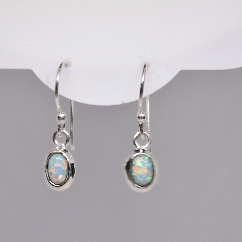 Just Neat Stuff White Opal Earrings — detail close-up