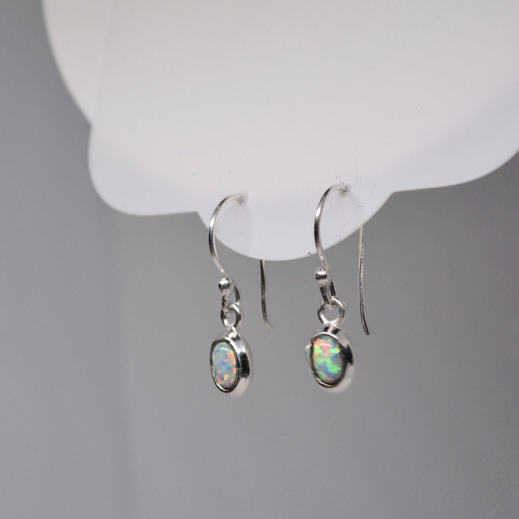 Just Neat Stuff White Opal Earrings — lifestyle context