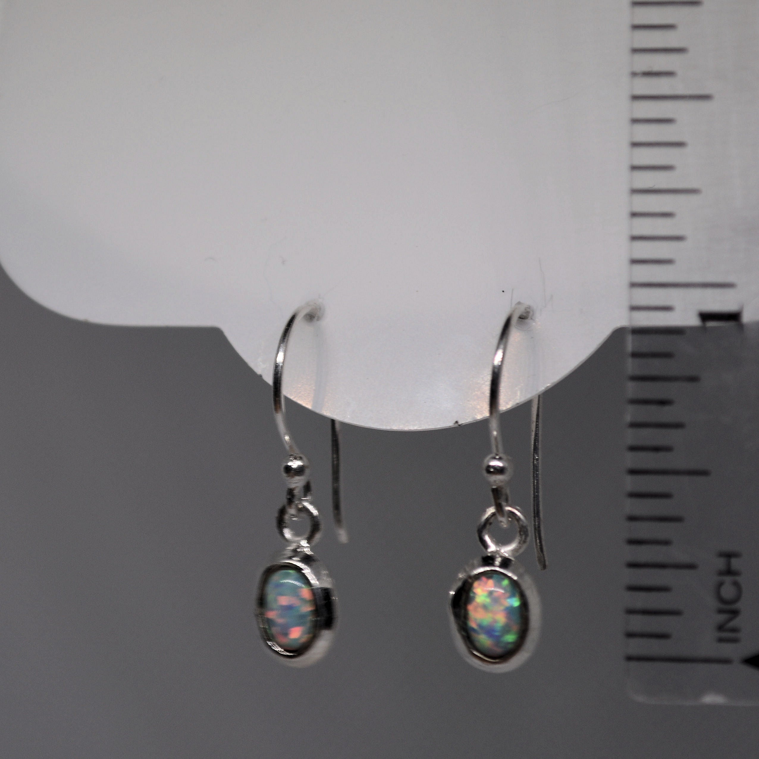 Just Neat Stuff White Opal Earrings — side view