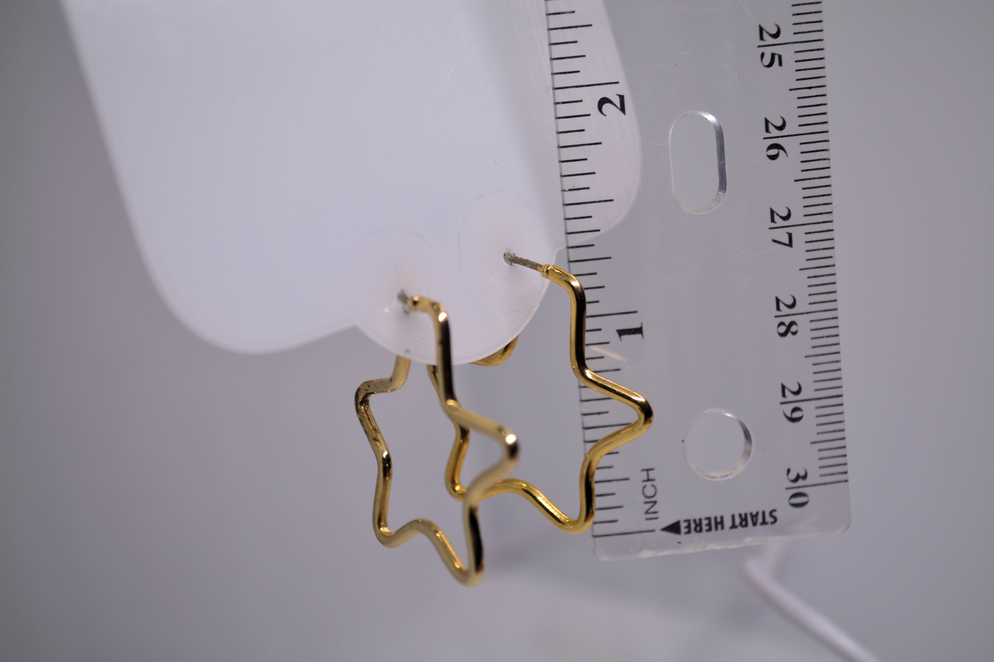 Just Neat Stuff Golden Star Earrings — in-use photo
