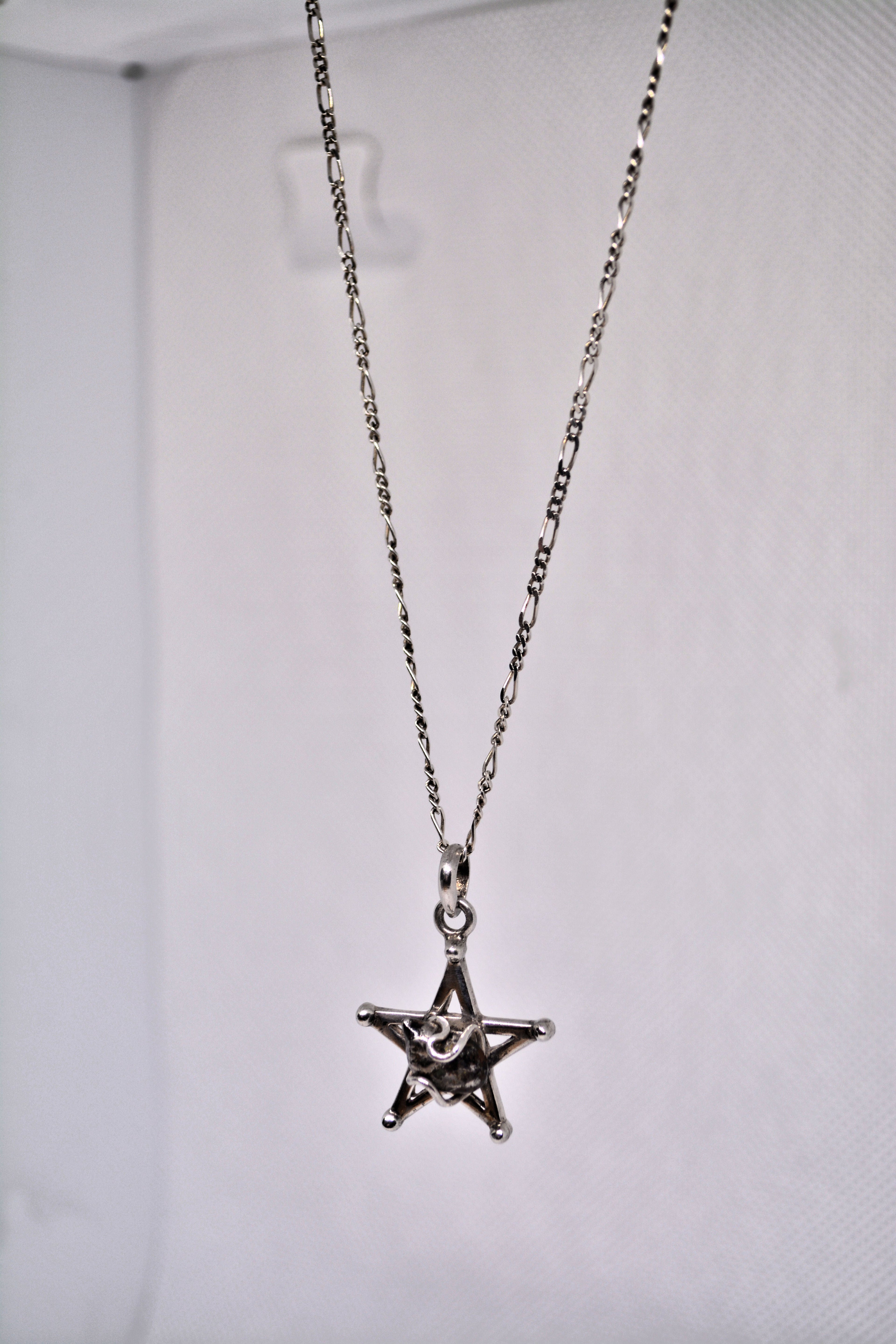 Just Neat Stuff Starborn Campo del Cielo Meteorite Star Pendant in Sterling Silver — lifestyle worn / used context