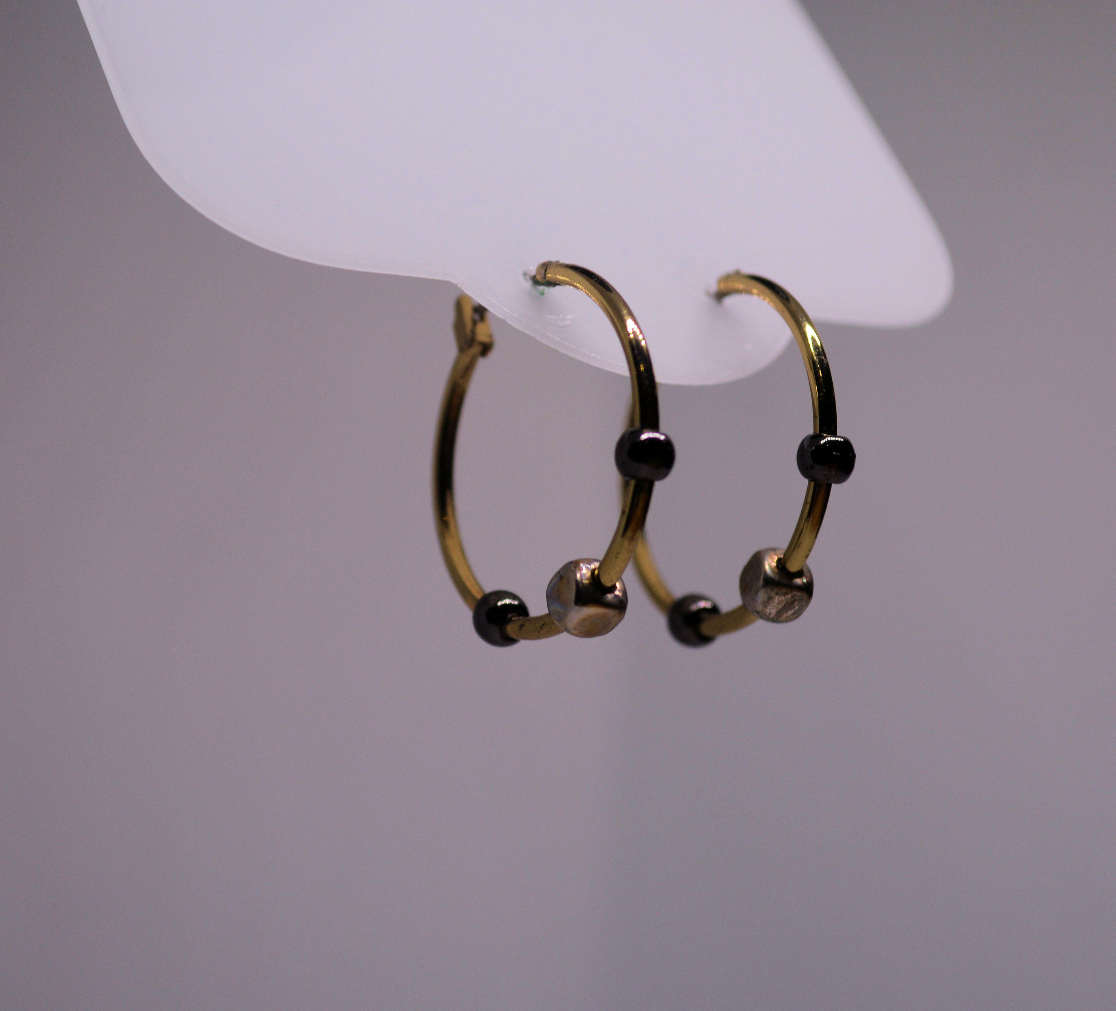 Just Neat Stuff Hematite Hoops — detail close-up