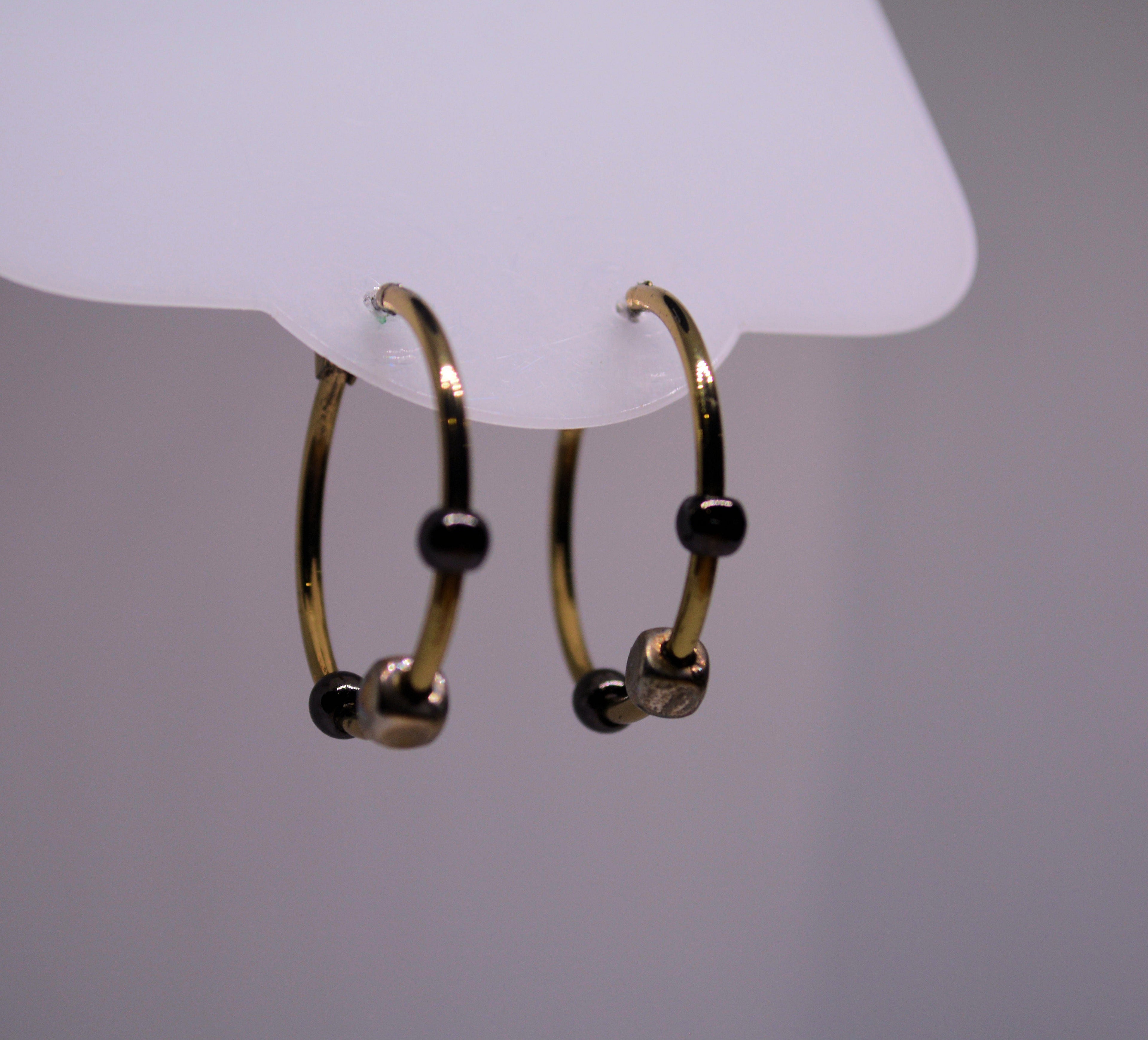 Just Neat Stuff Hematite Hoops — lifestyle context