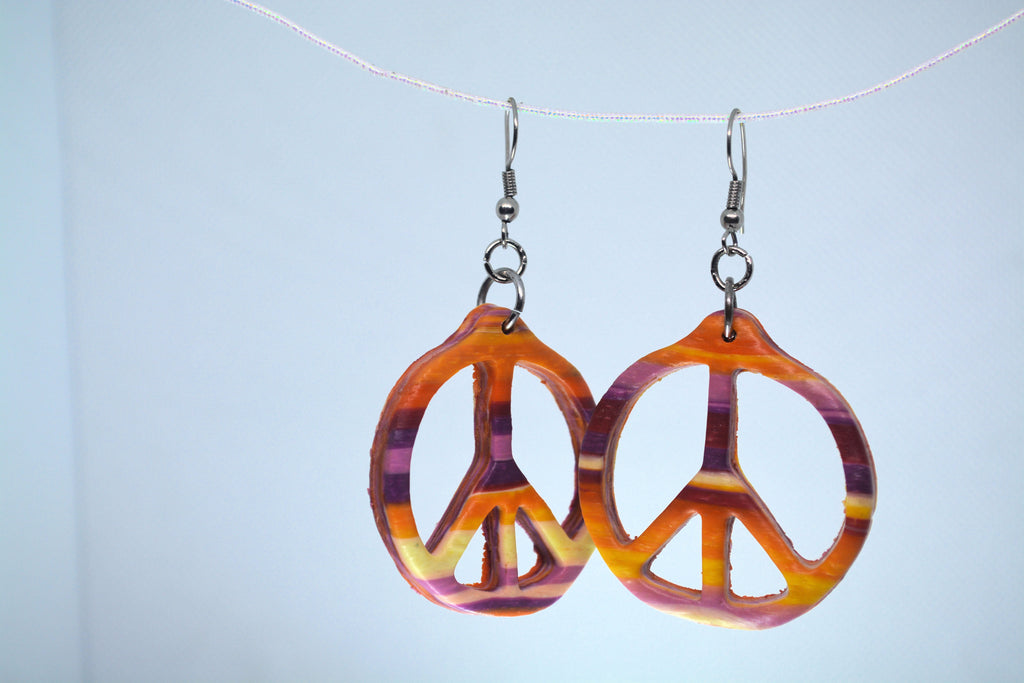 Just Neat Stuff Peace Earrings — detail close-up
