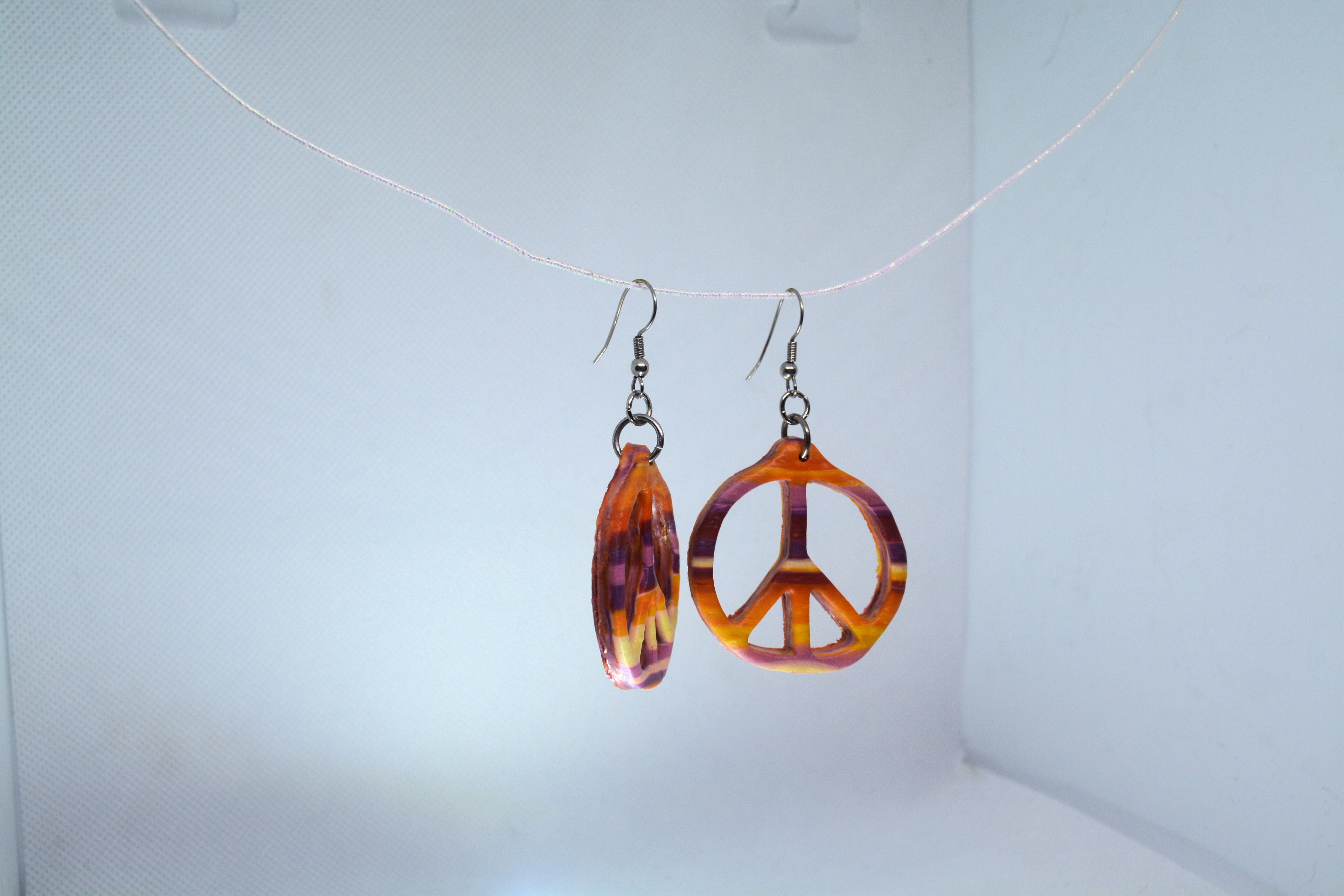 Just Neat Stuff Peace Earrings — lifestyle context