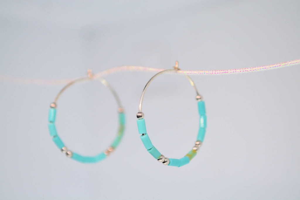 Just Neat Stuff Turquoise hoop earrings — side view