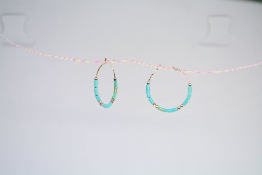 Just Neat Stuff Turquoise hoop earrings — back view