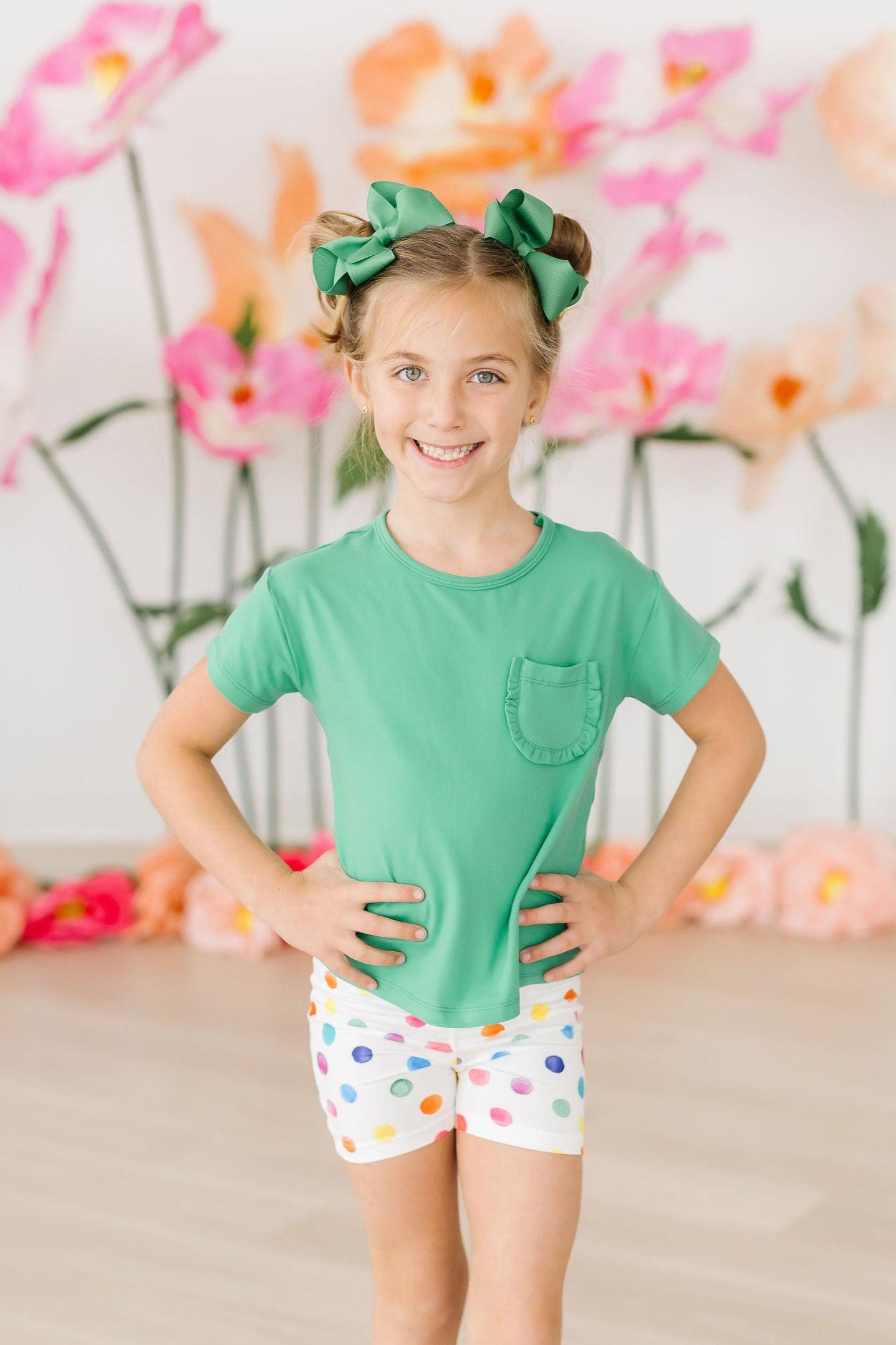 Mila & Rose ® Kelly Green Ruffle Pocket Tee — lifestyle context