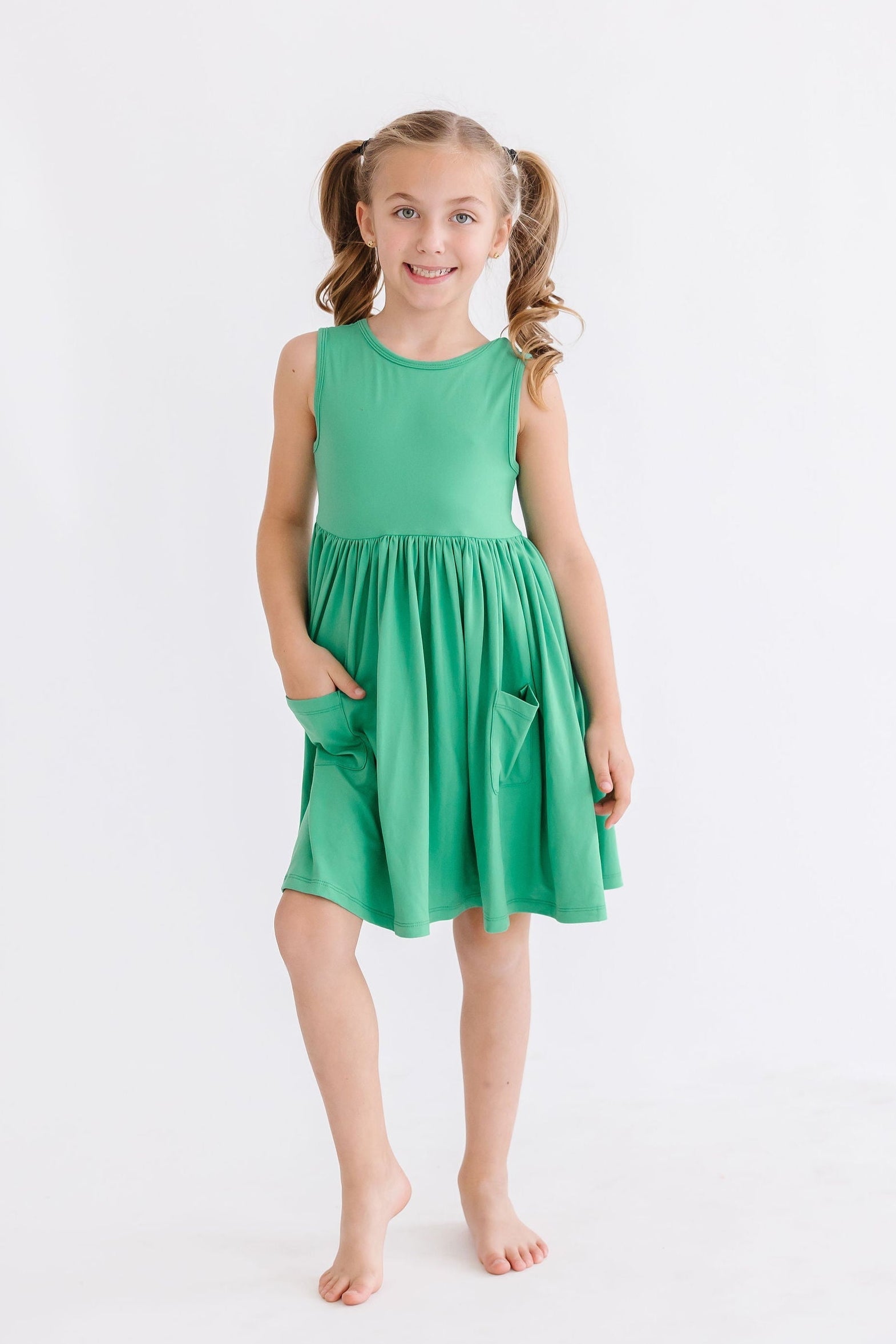 Mila & Rose ® Kelly Green Tank Pocket Twirl Dress — lifestyle context