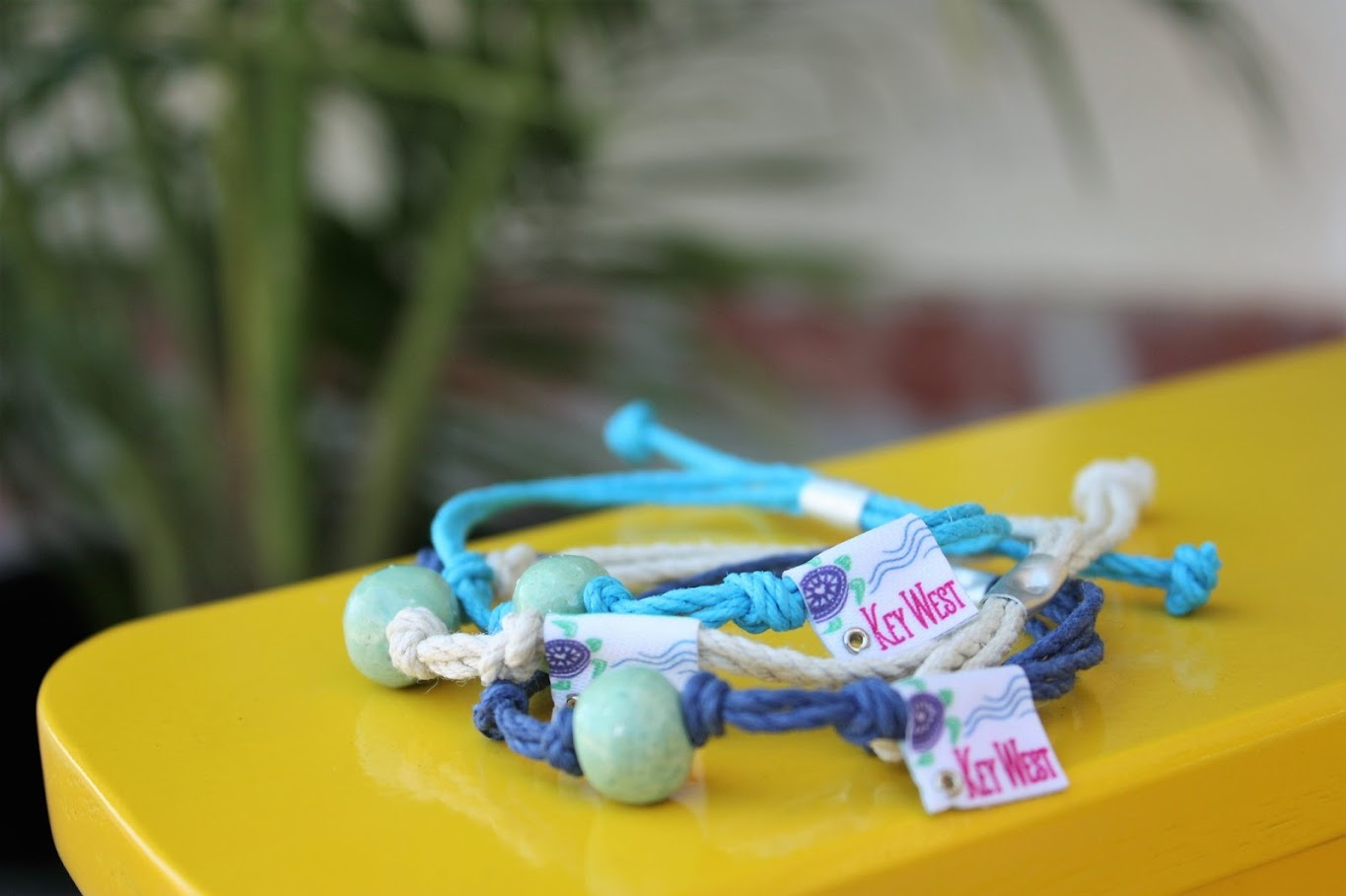 Earth Bands Key West, FL — Earth Bands branding close-up