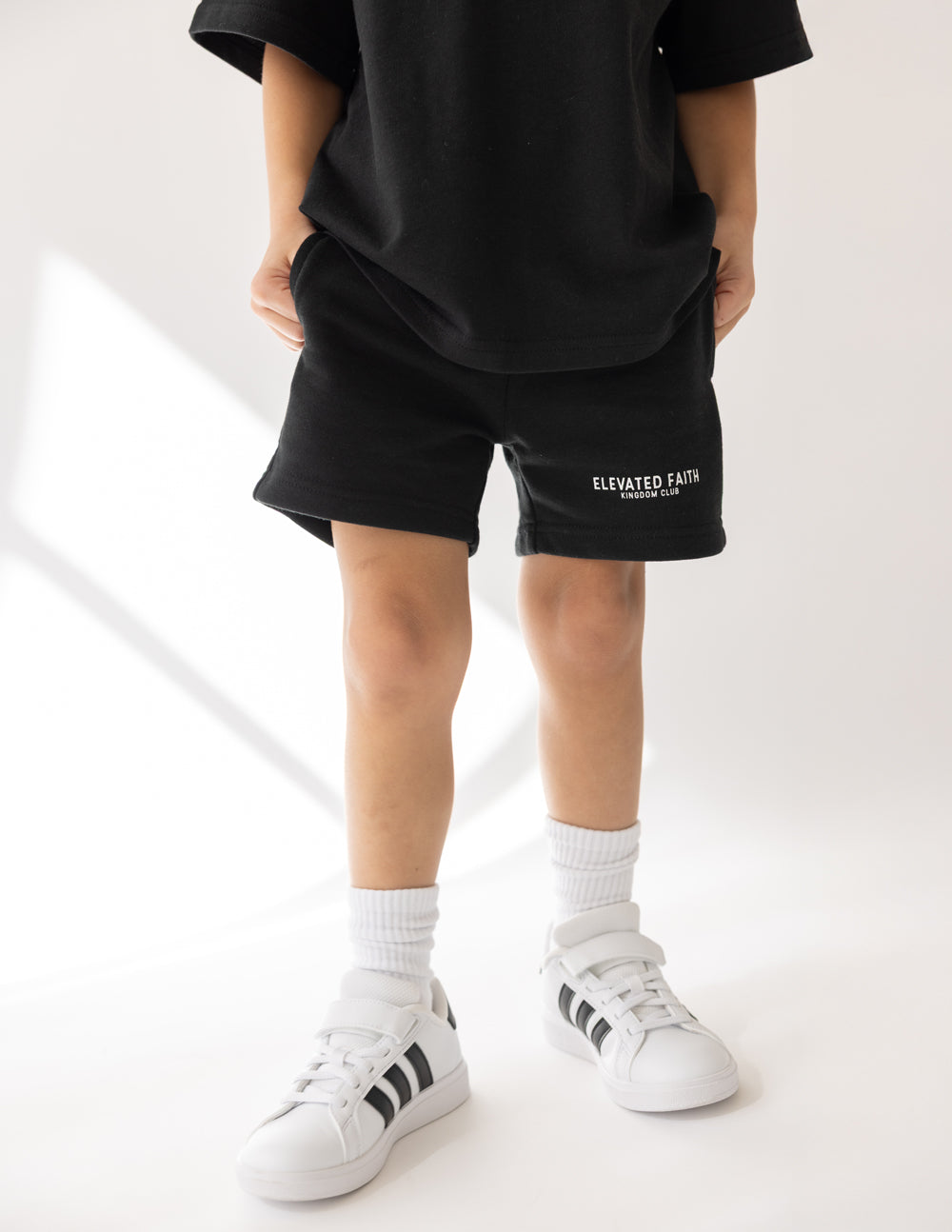 Elevated Faith Kingdom Club Black Kids Short — side view