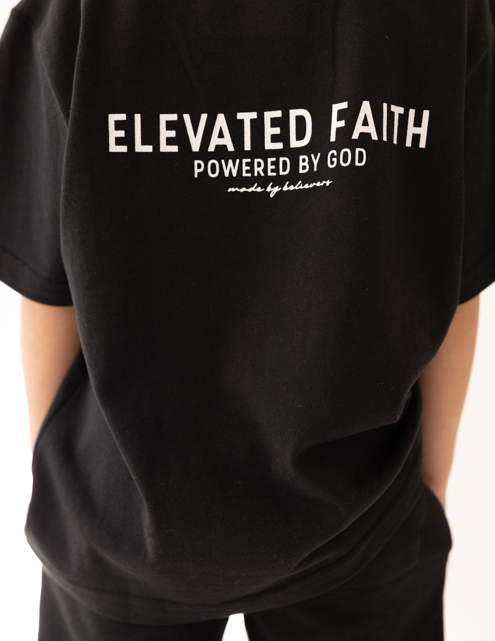 Elevated Faith Kingdom Club Black Kids Tee — lifestyle context
