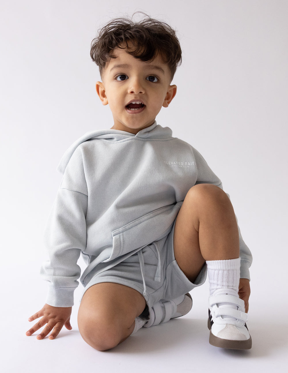 Elevated Faith Kingdom Club Blue Kids Hoodie — lifestyle context