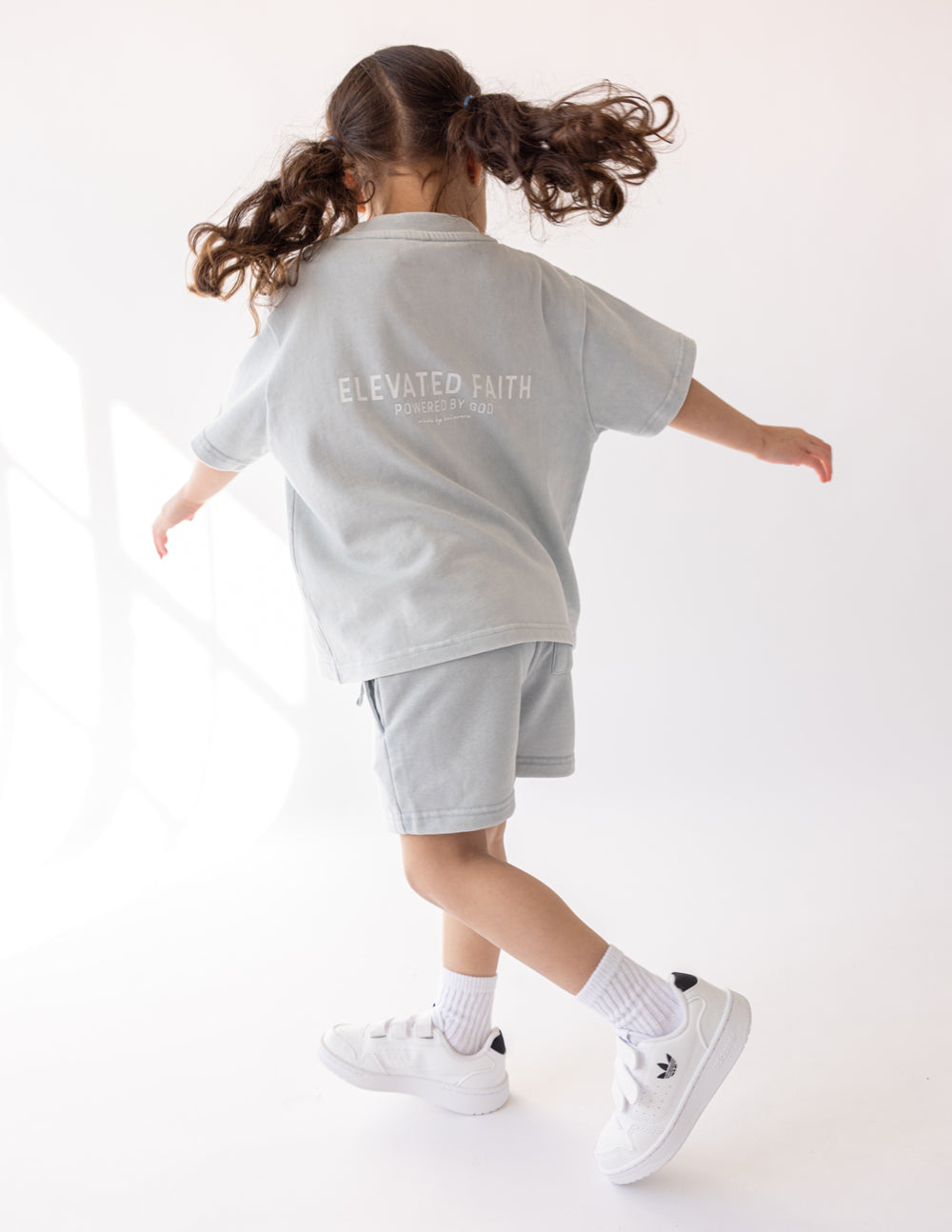 Elevated Faith Kingdom Club Blue Kids Tee — side view