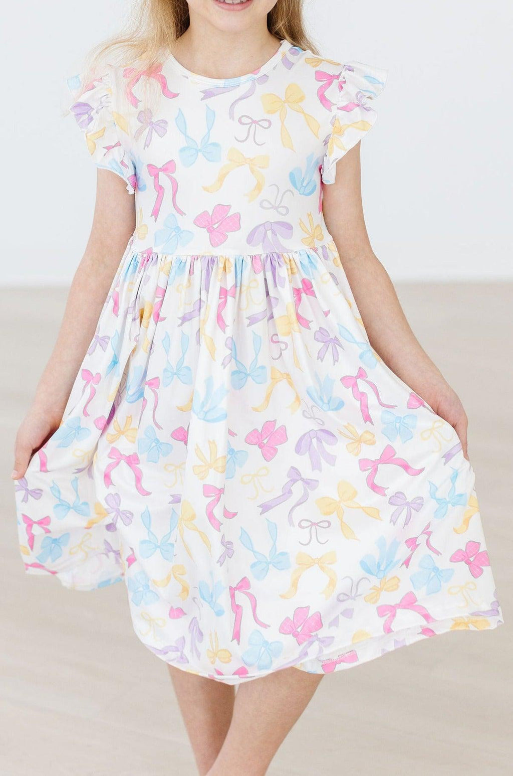 Mila & Rose ® Bow-tastic Flutter Sleeve Twirl Dress — lifestyle context