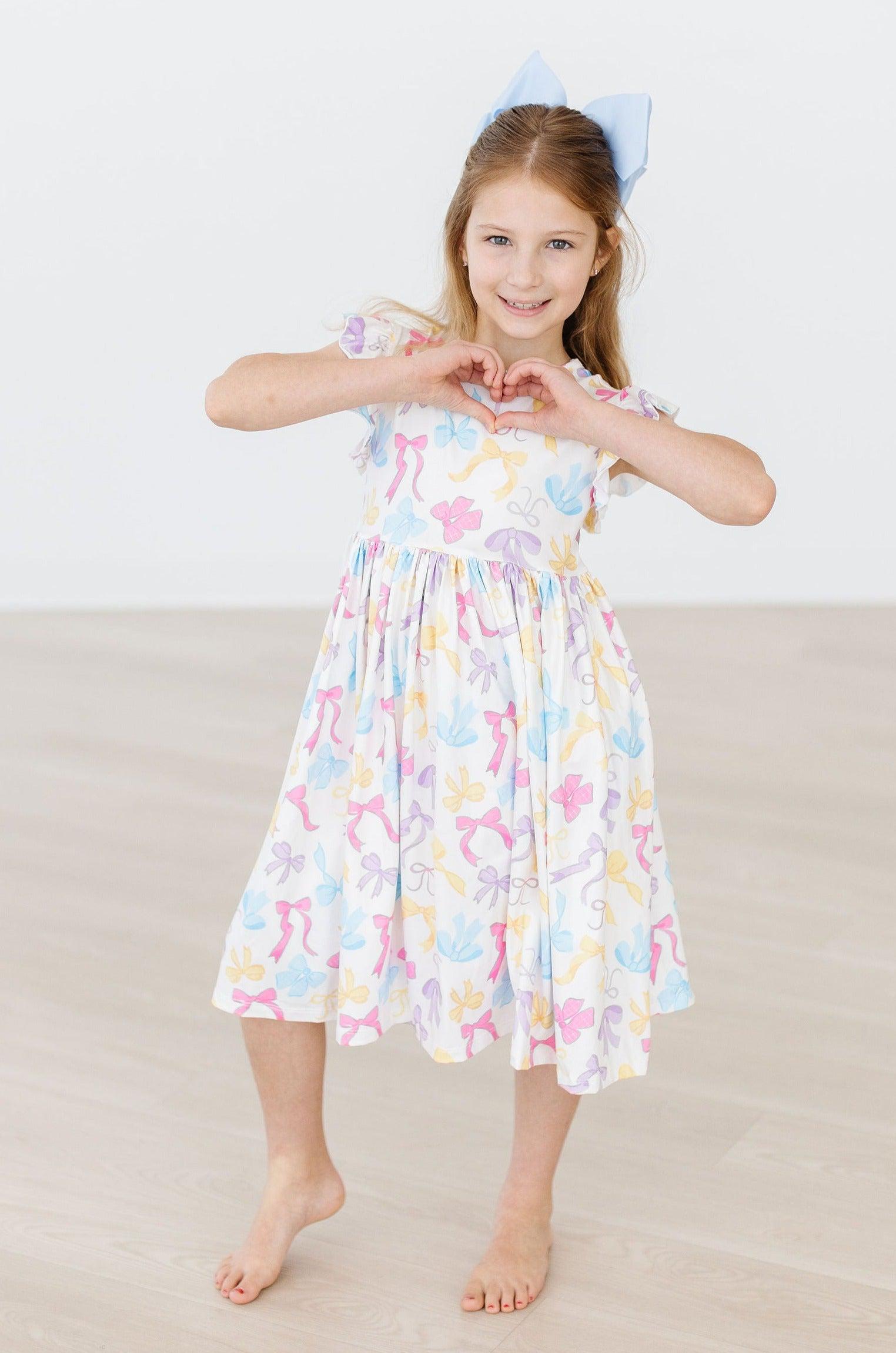 Mila & Rose ® Bow-tastic Flutter Sleeve Twirl Dress — back view