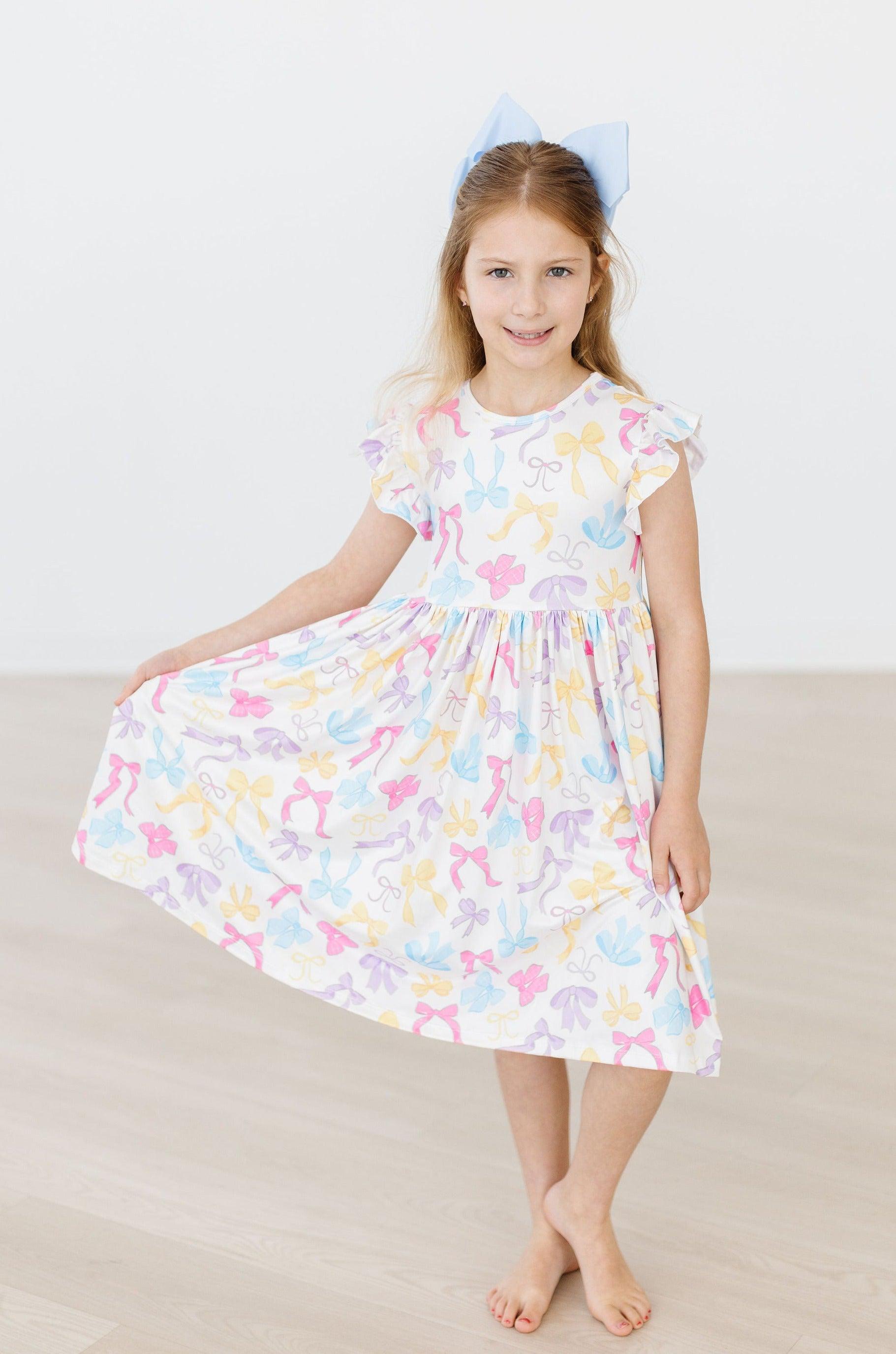 Mila & Rose ® Bow-tastic Flutter Sleeve Twirl Dress — in-use photo