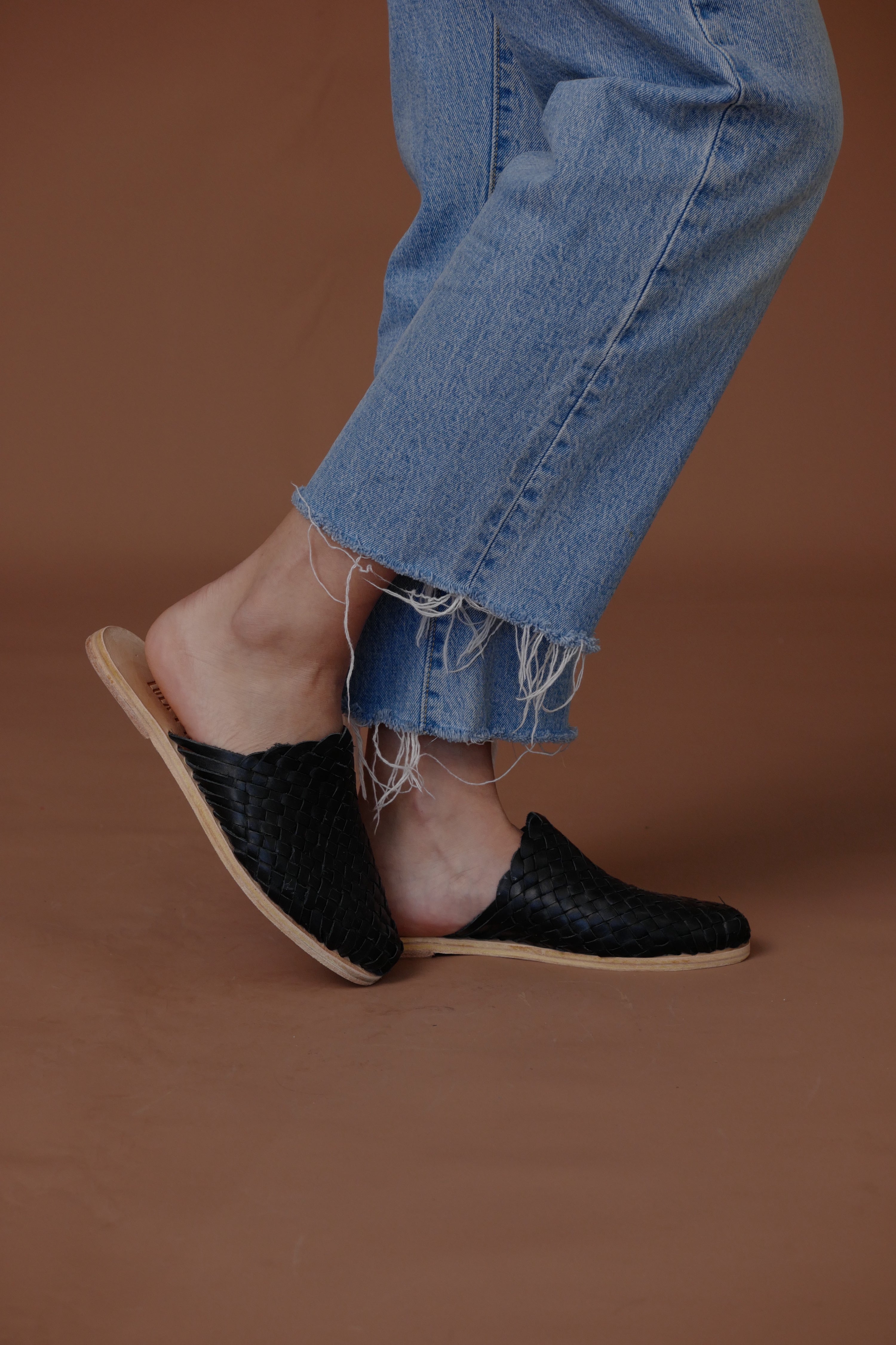 LOLA Y TULA Hand Woven Leather Slides Black — side view