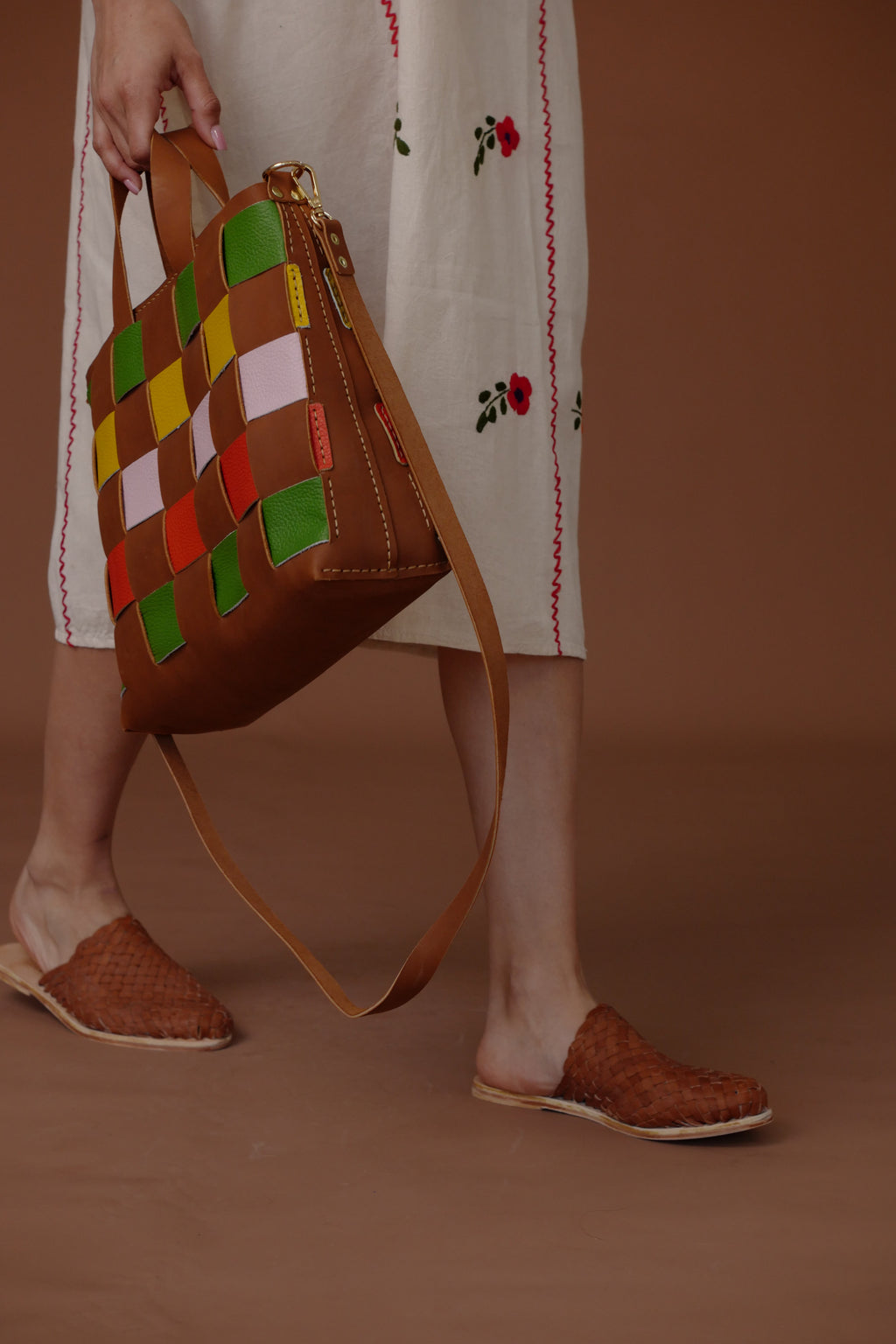 LOLA Y TULA Hand Woven Leather Slides Camel — lifestyle context