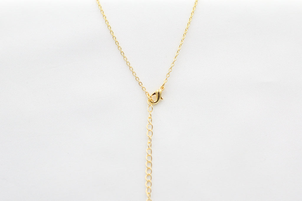 KADOU BOUTIQUE Pentagon Mother of Pearl Pendant Necklace — detail close-up