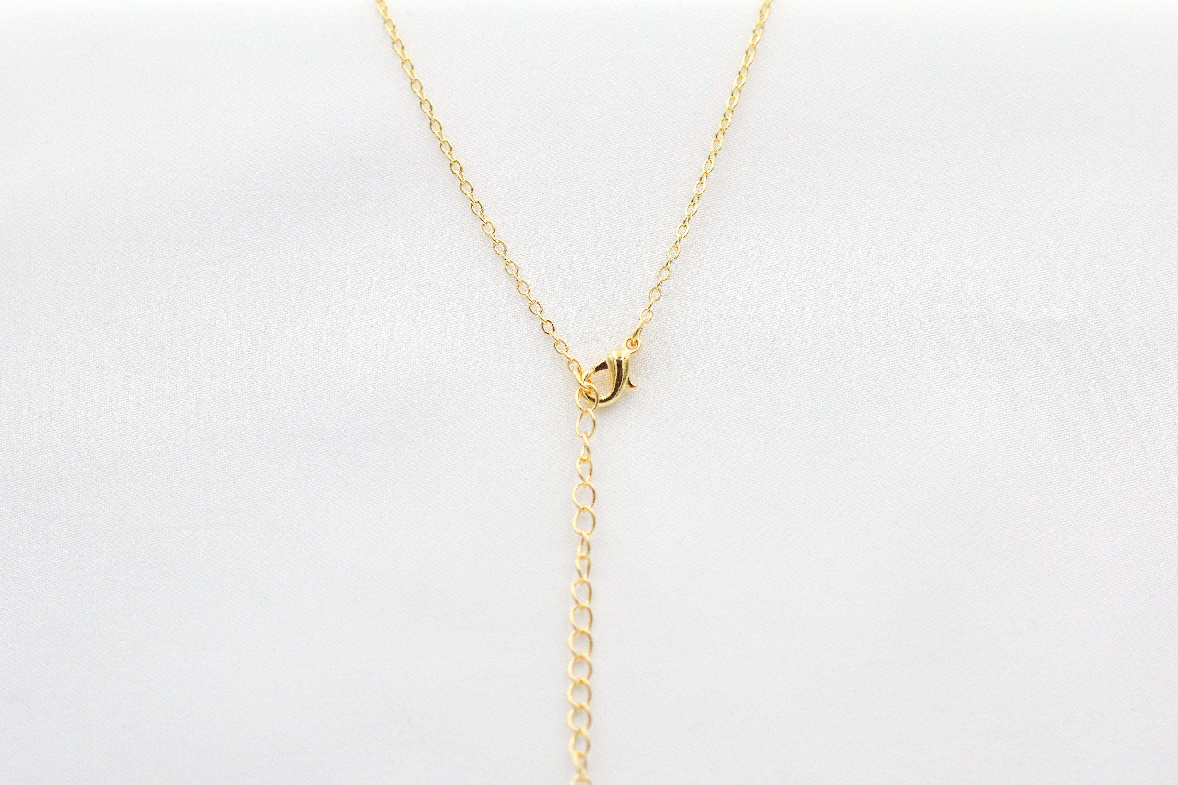 KADOU BOUTIQUE Pentagon Mother of Pearl Pendant Necklace — detail close-up
