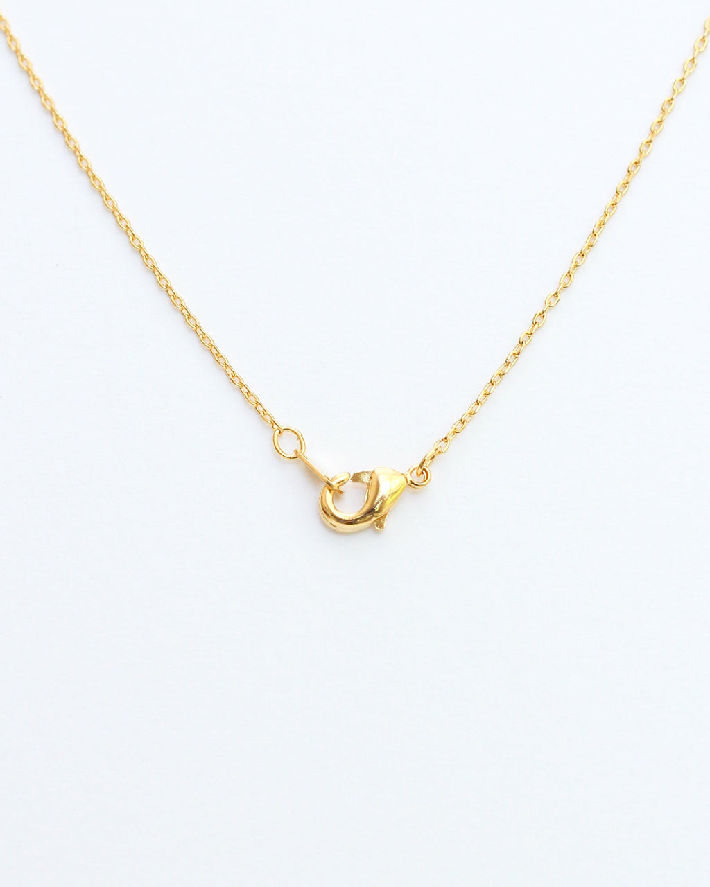KADOU BOUTIQUE Mini Pave Initial Necklace — detail close-up