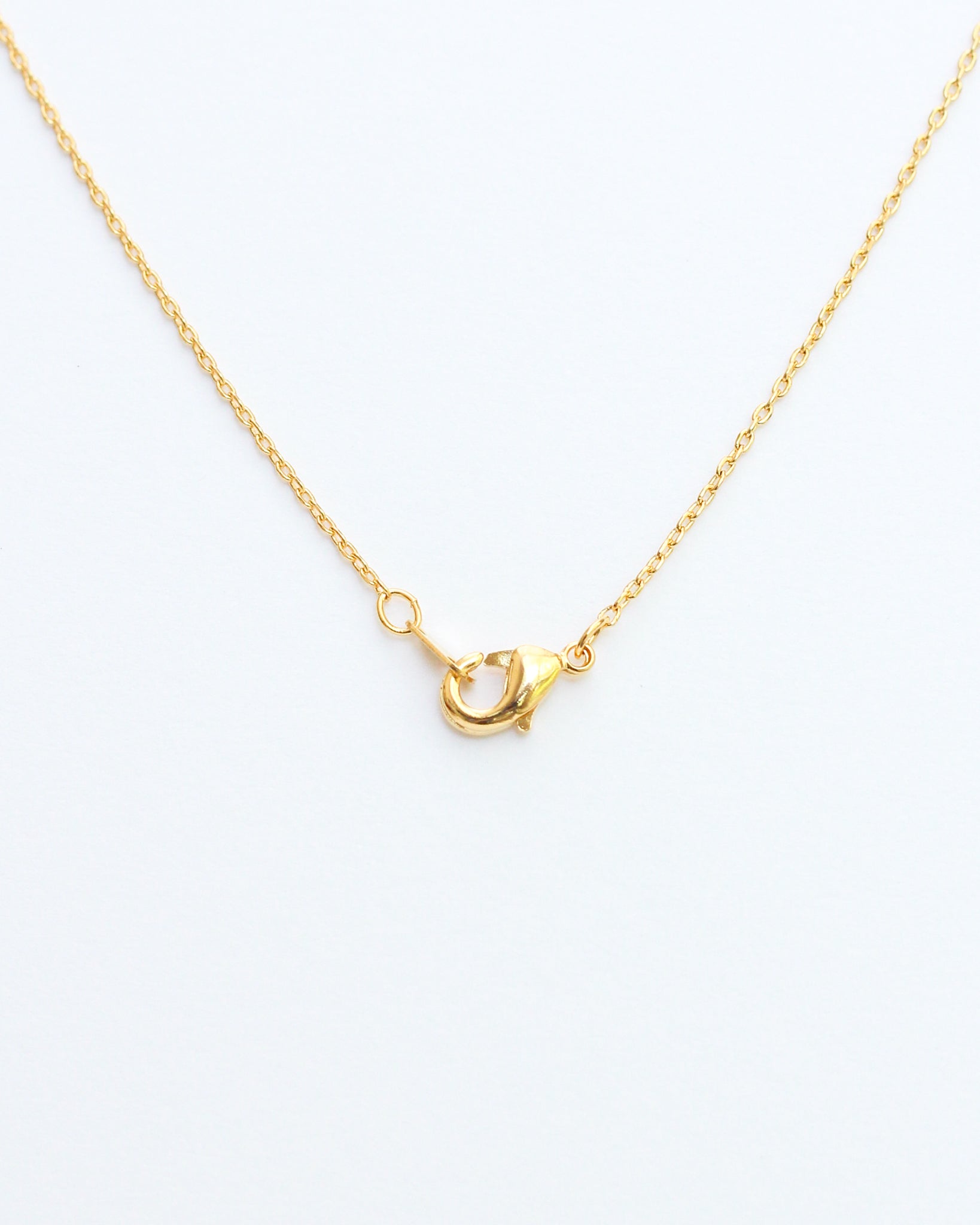 KADOU BOUTIQUE Mini Pave Initial Necklace — detail close-up