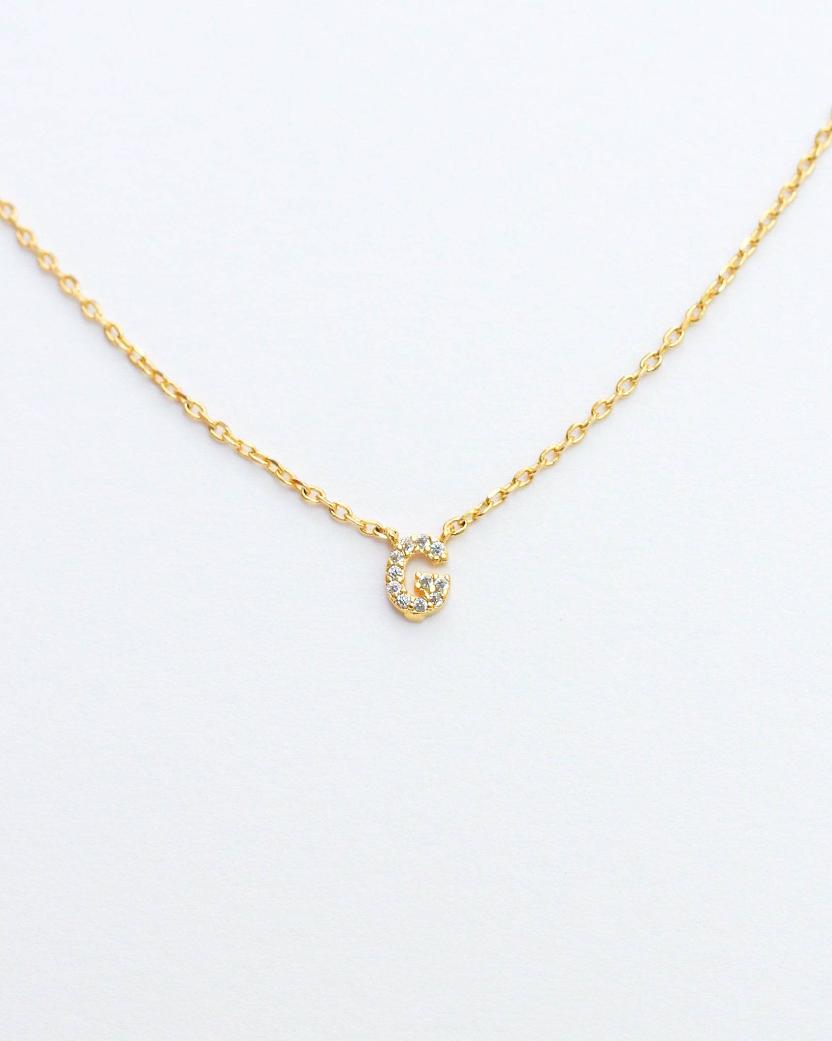 KADOU BOUTIQUE Mini Pave Initial Necklace — in-use photo